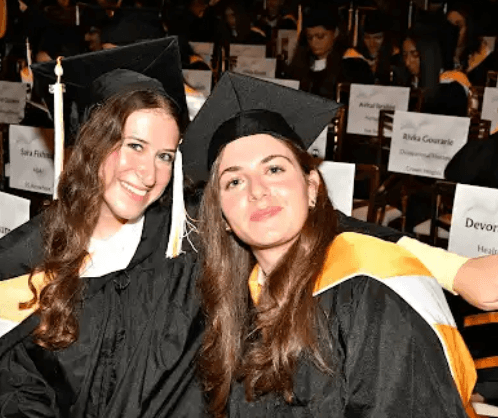 man holding glass door