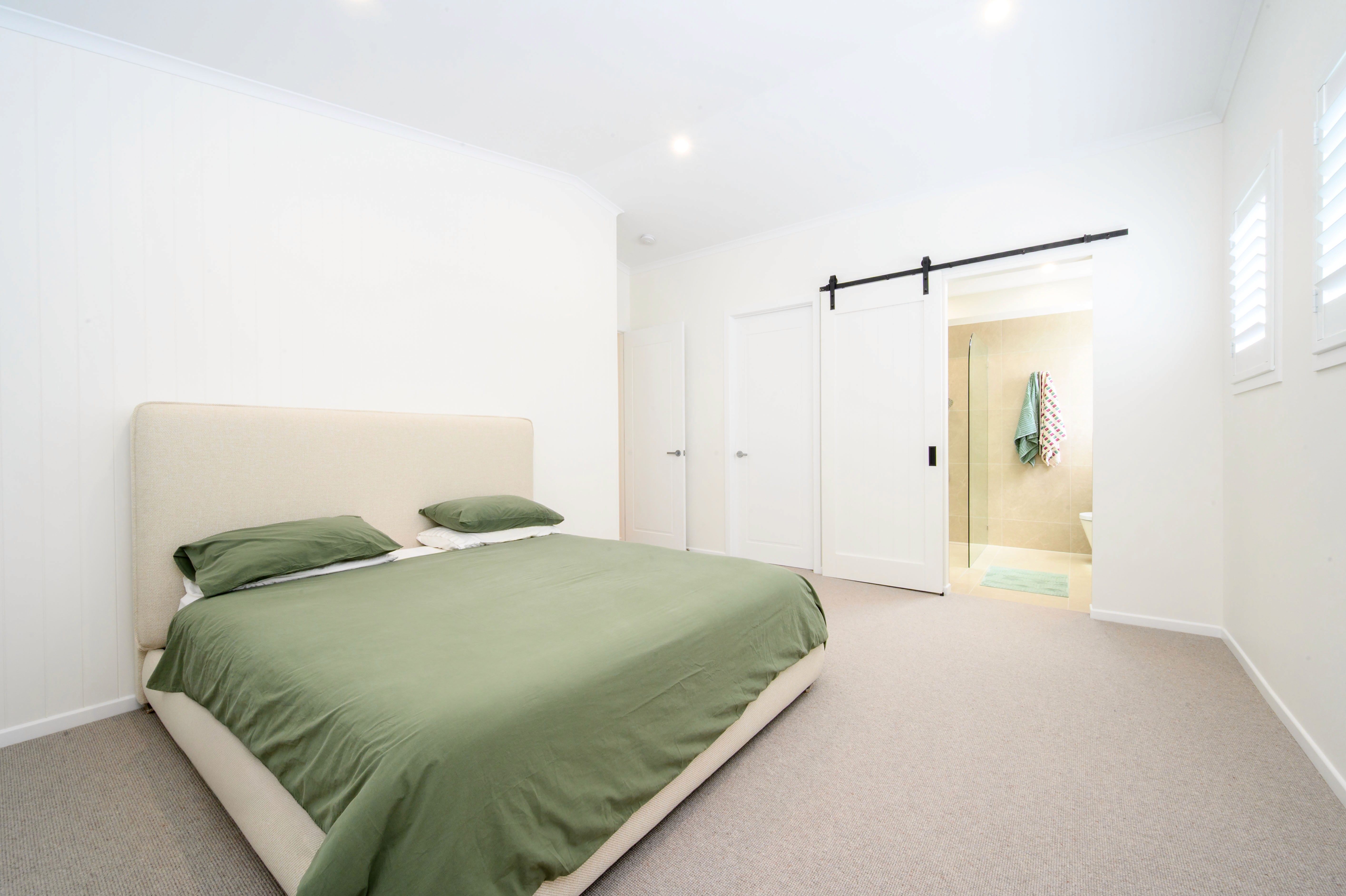 Smooth white walls and ceiling after a Gold Coast interior paint job by Red Dragon Painting