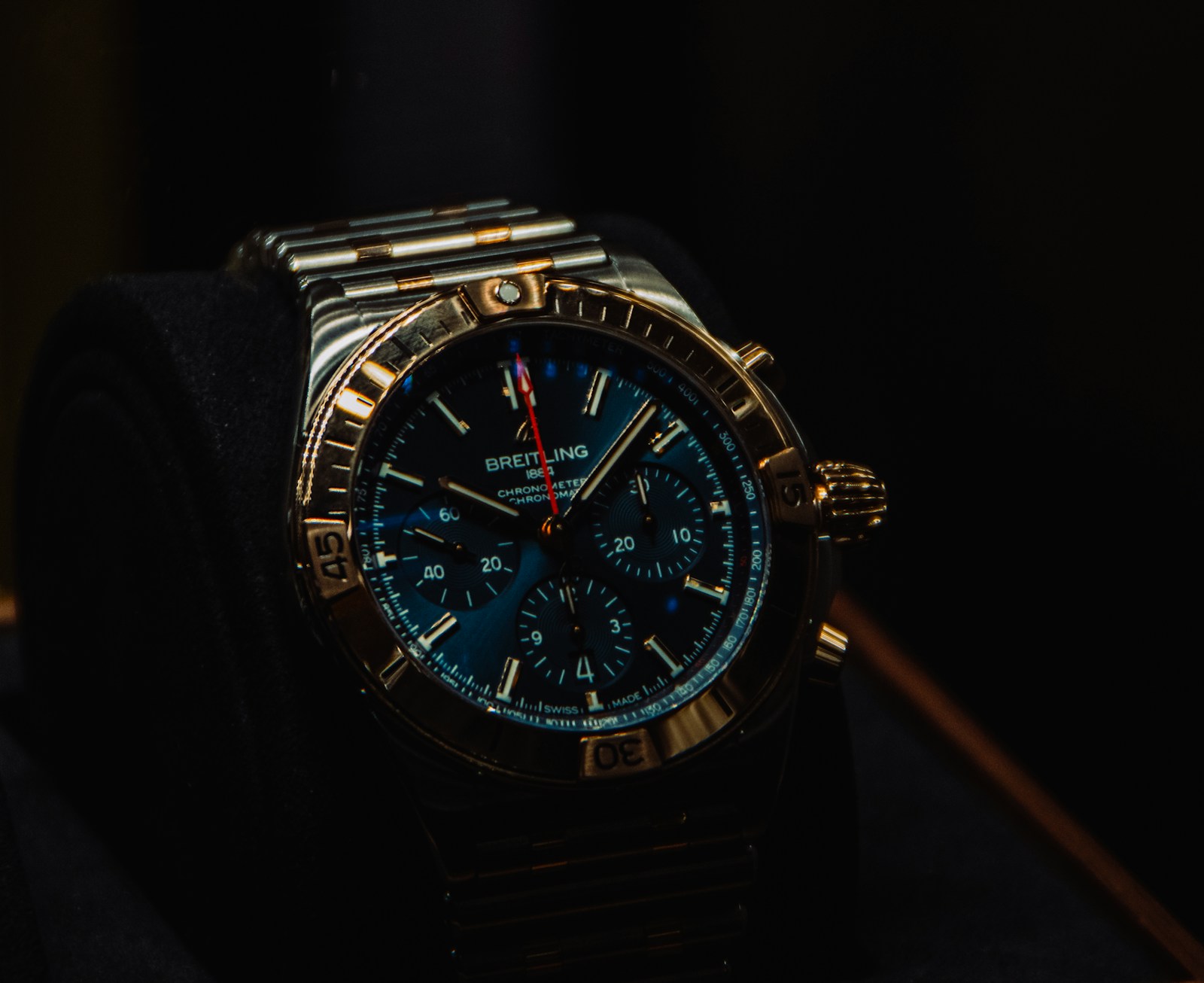 Silver and black chronograph watch