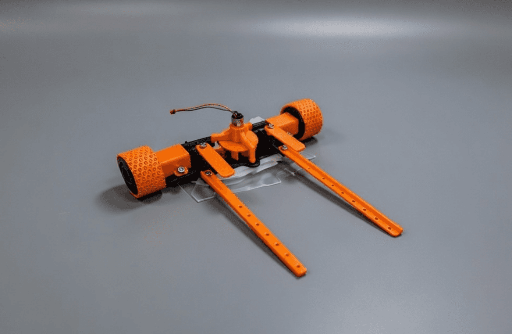 Advanced suction chassis top view – impeller mount, sensor arm slots, PCB tray