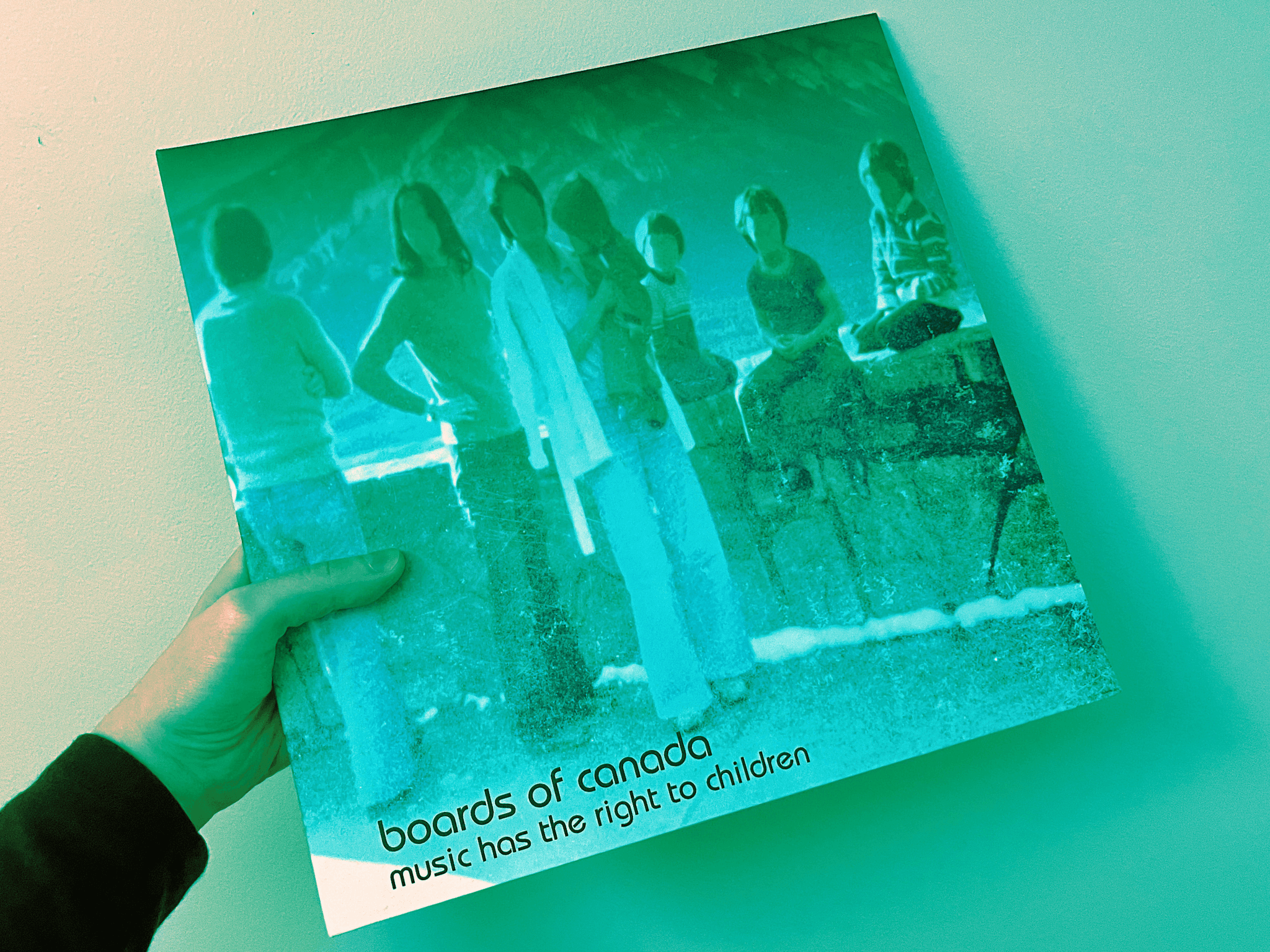 a boards of canada album with a pink filter