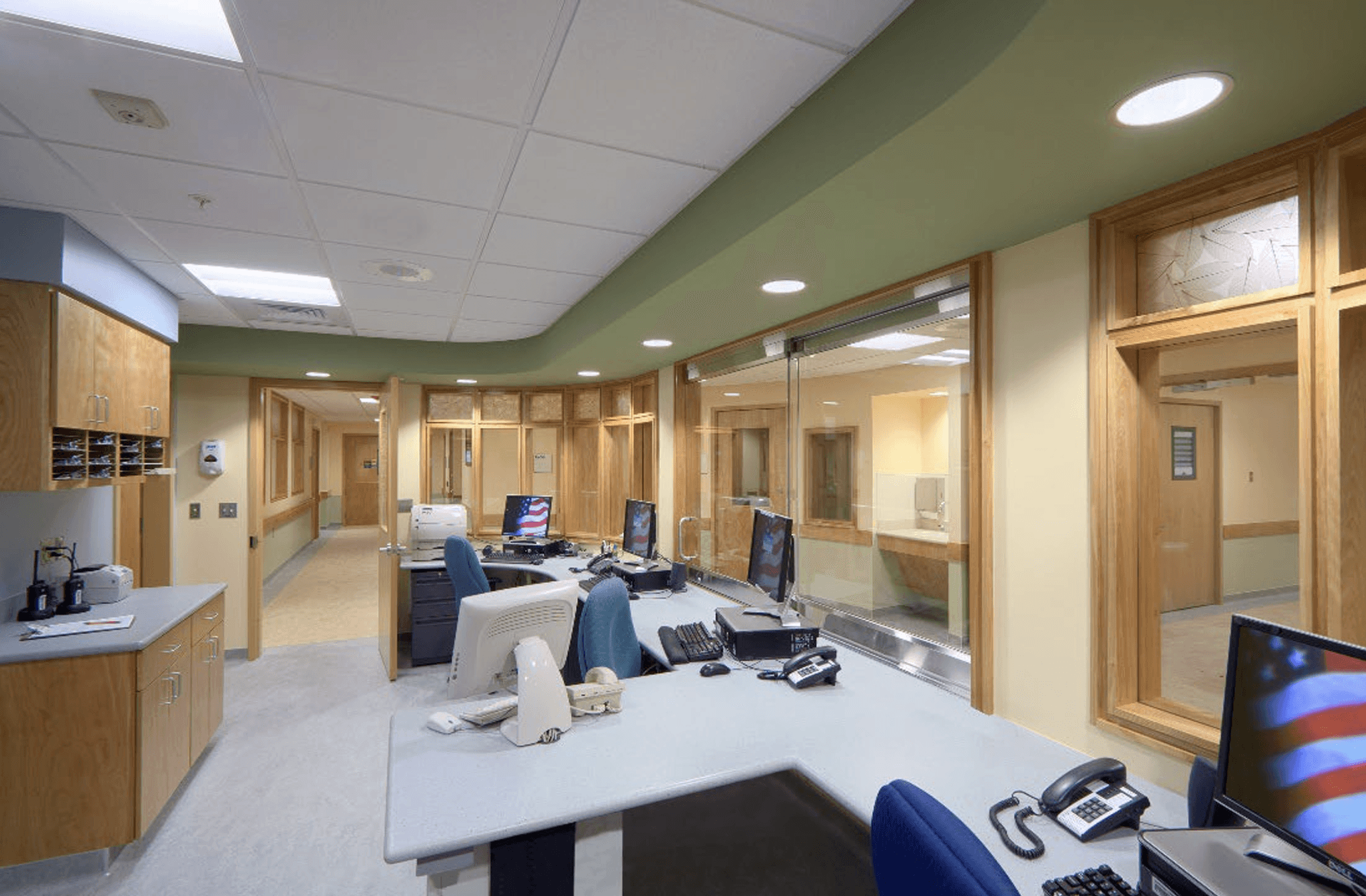 VA women's mental health clinic renovation interior showing modern patient consultation room with wood cabinetry