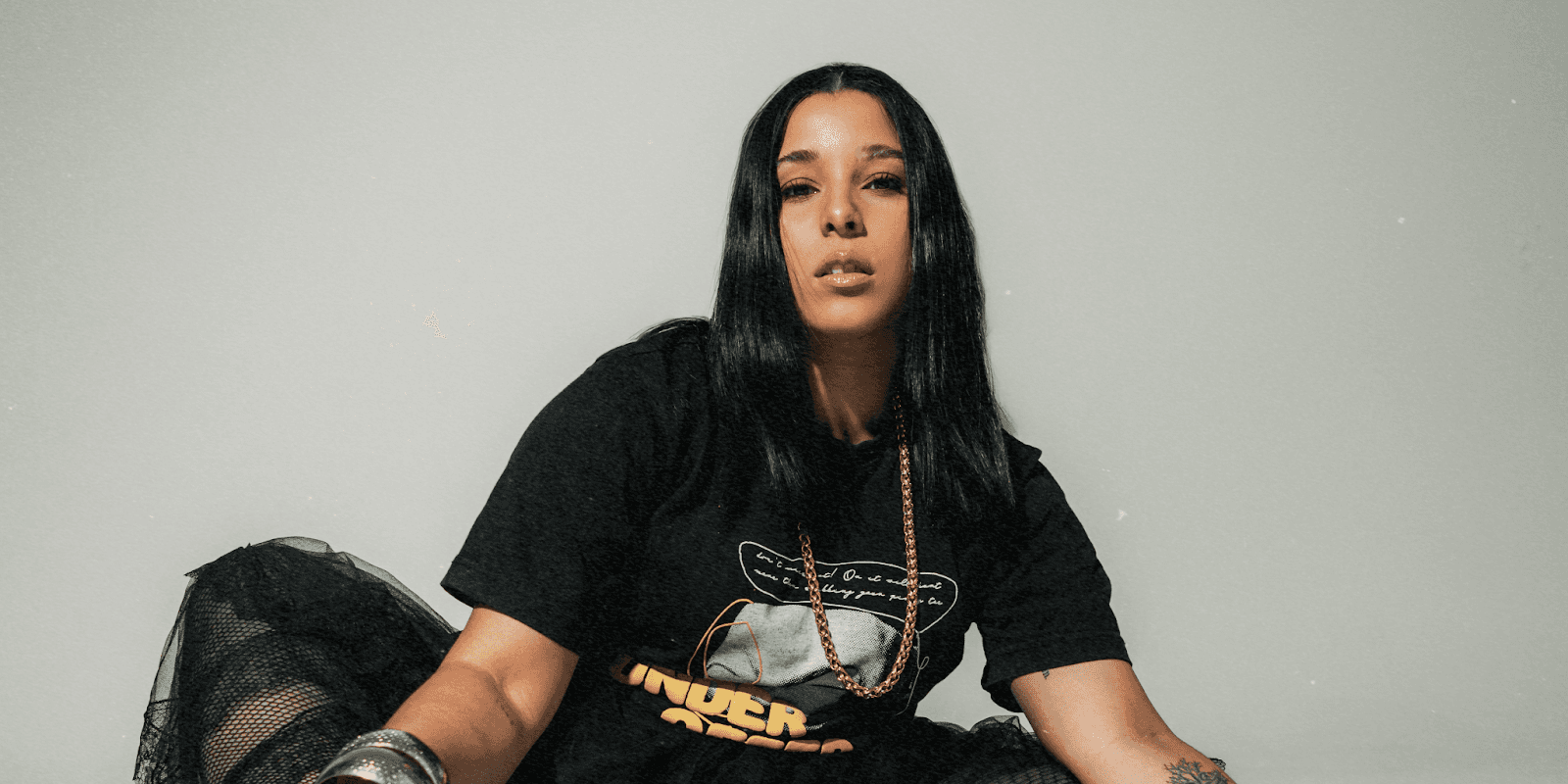 "Merlis Camilo, Dominican singer-songwriter and founder of Alma Music Group, blending music and digital strategy to empower artists."