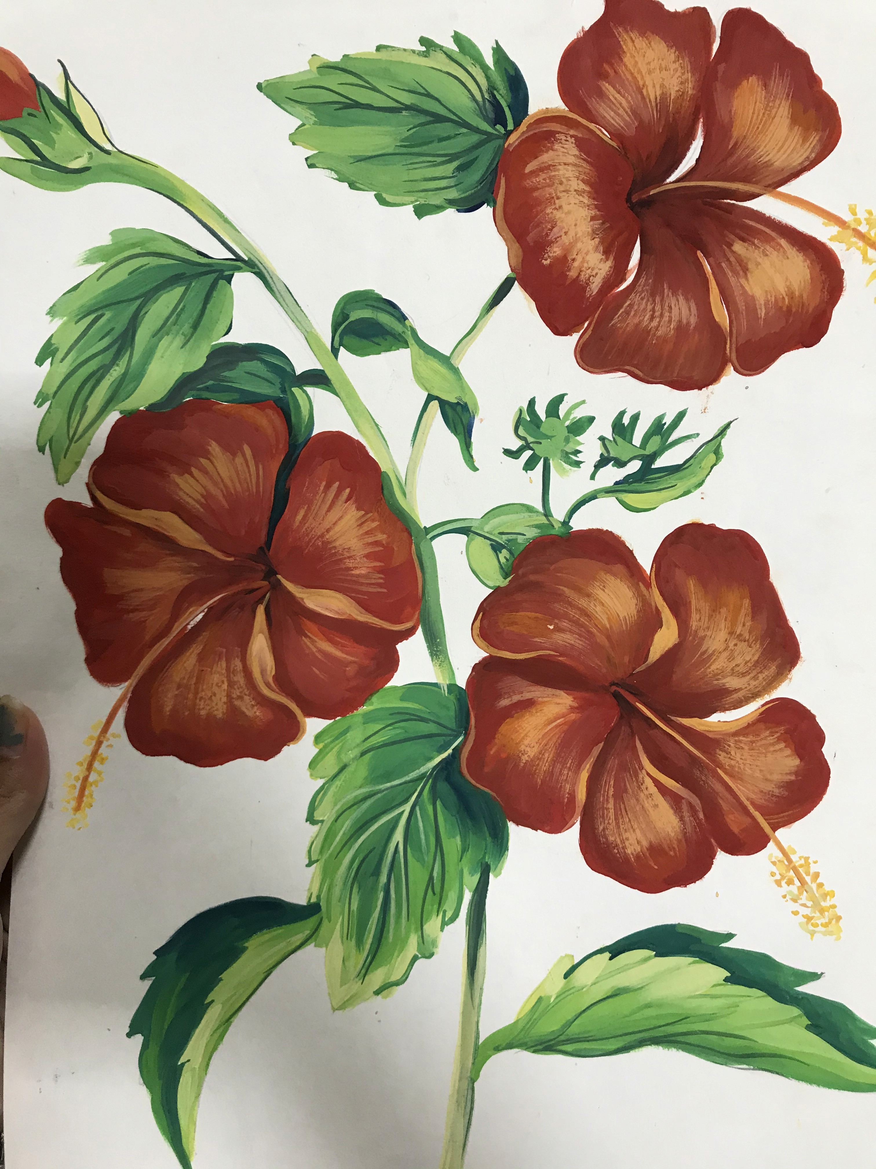 A man stading with Surfboard