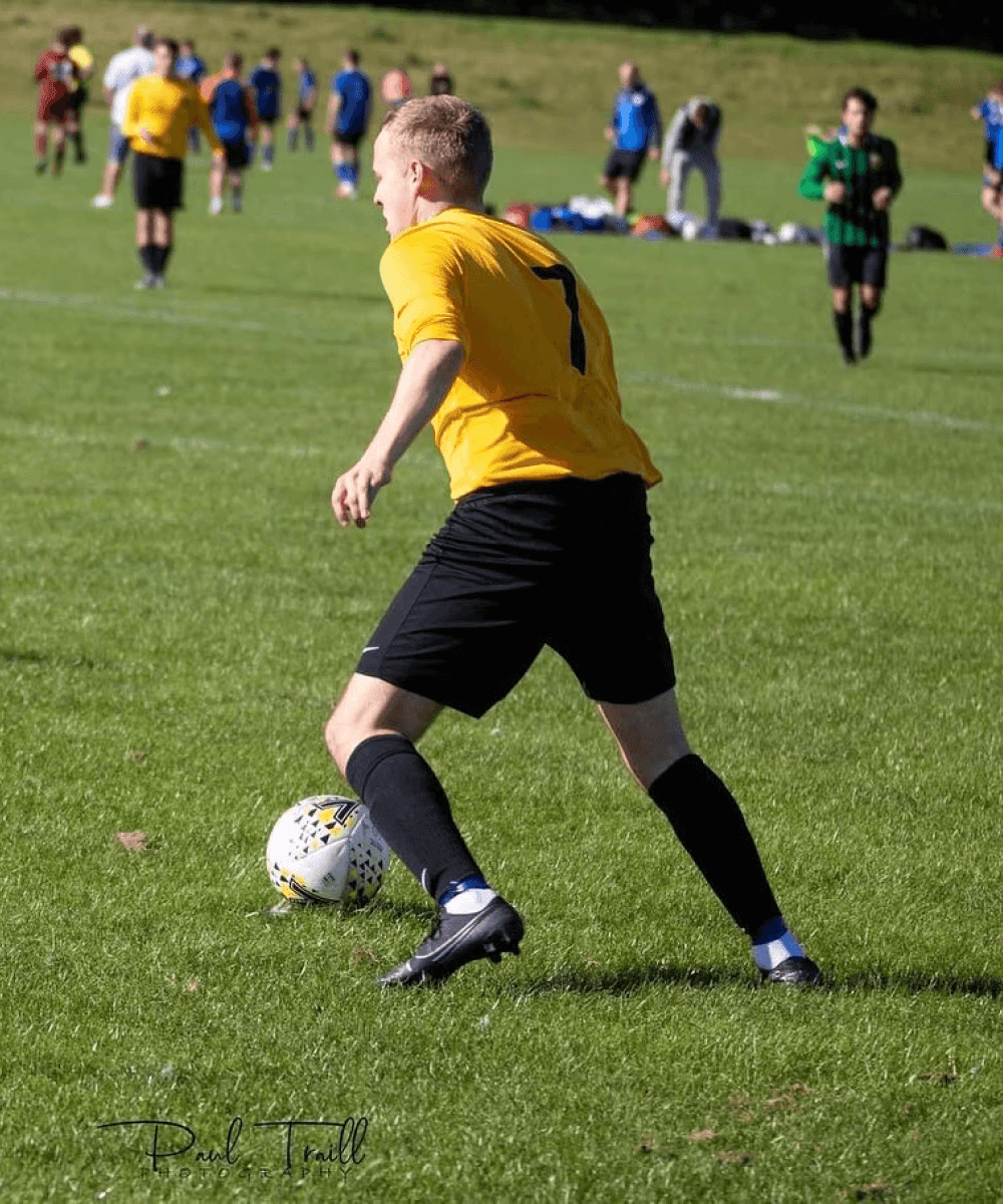 Matt playing football