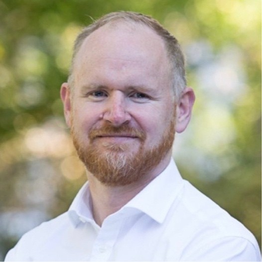 Portrait of Daniel Hayes, founder of EarlyBird.
