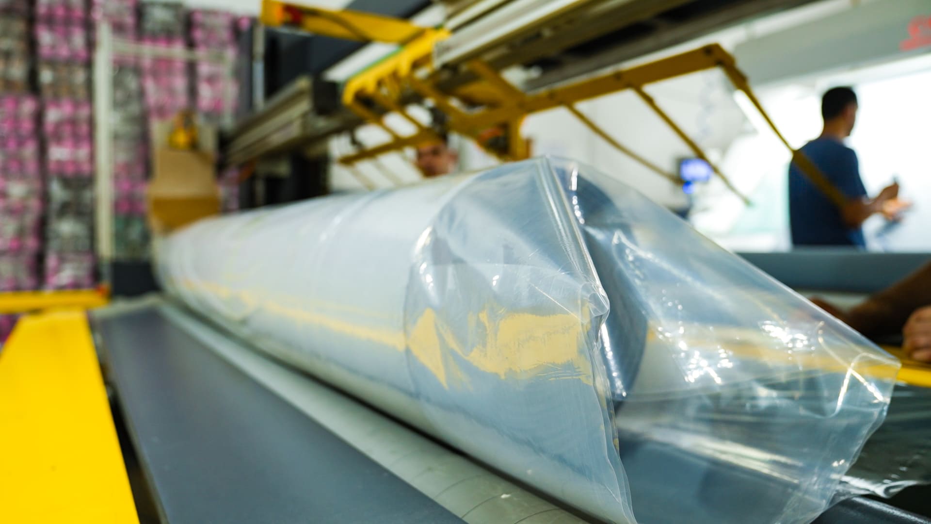 Fabric roll on conveyor.