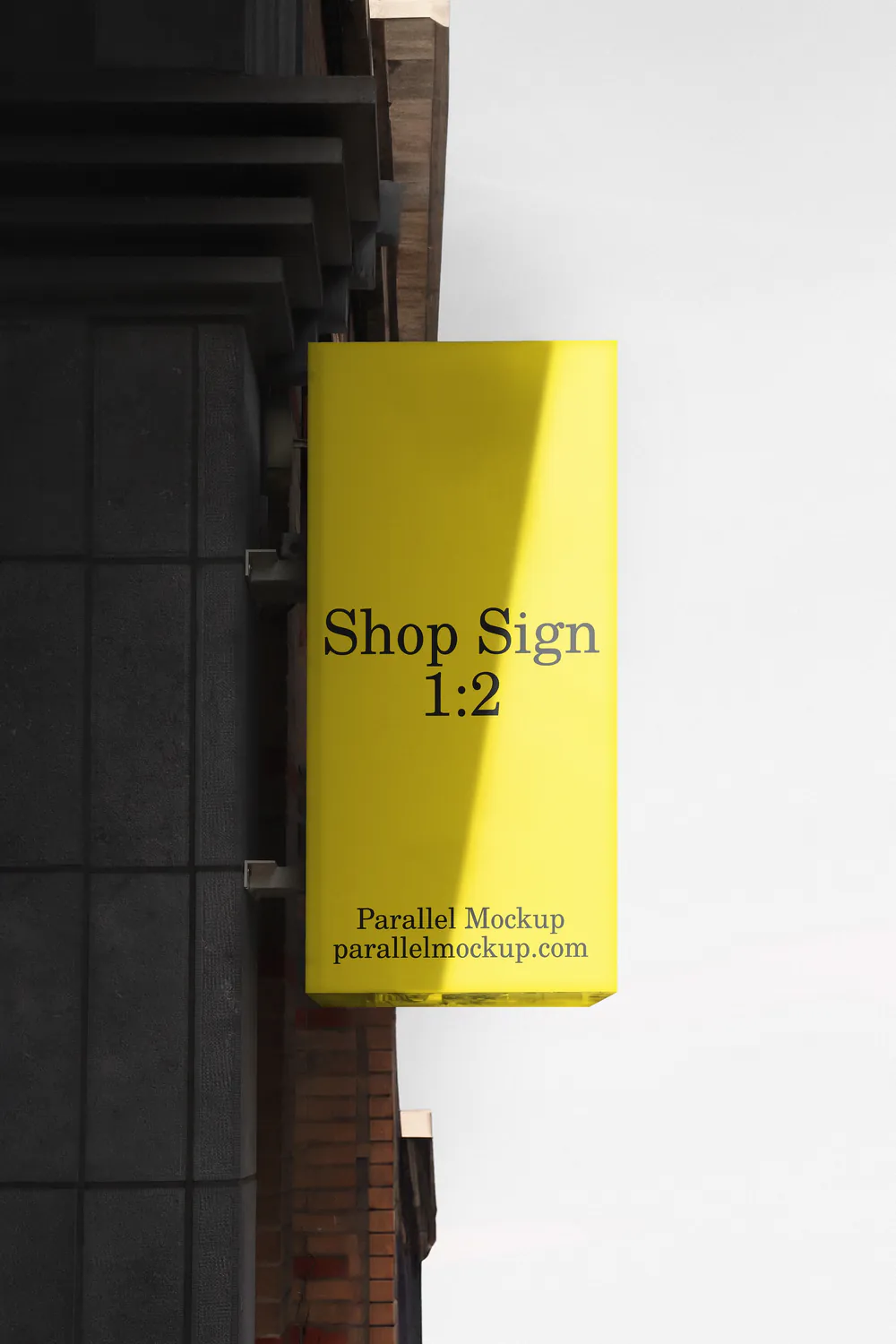 A yellow booklet with text partially visible, resting against a dark surface in a well-lit area.