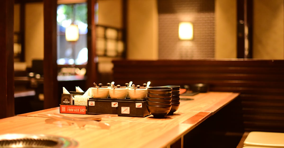 Warm and inviting restaurant interior with wooden tables and soft lighting, perfect ambience for din