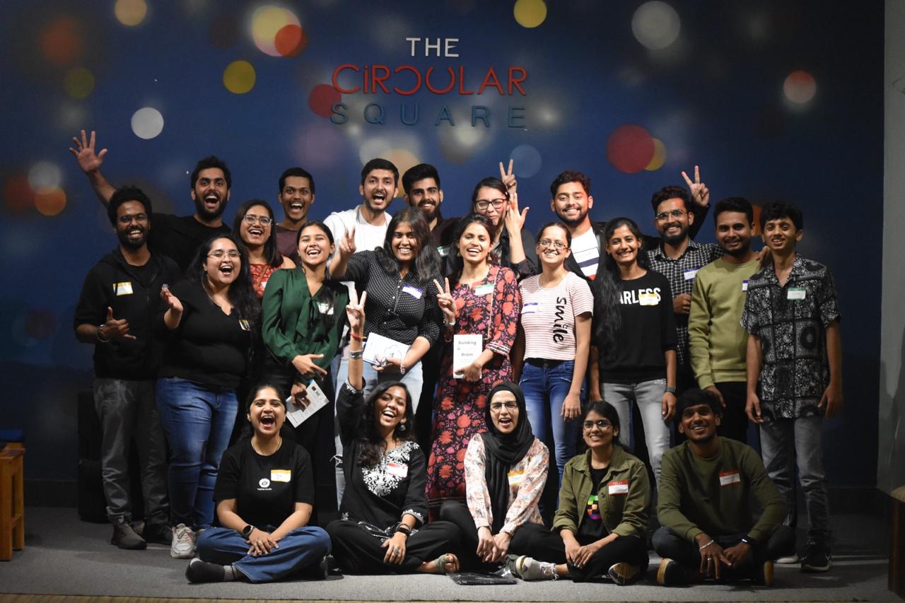 A diverse group of student poses together in design day workshop at kaphal studio.