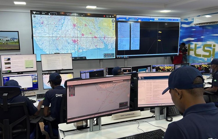 Lab technician kept a small chemical bottle in a stand