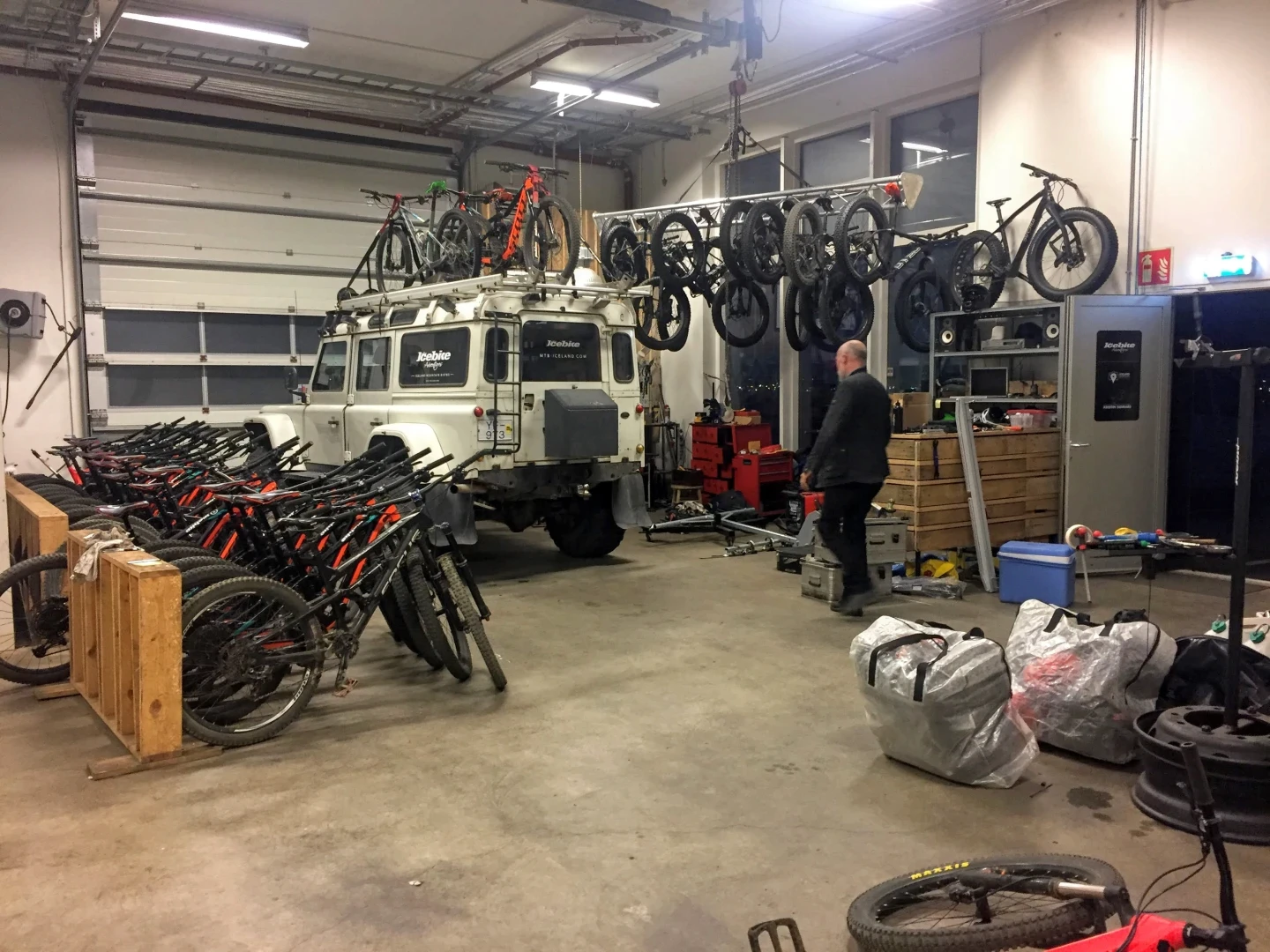 Inside the old Icebike garage with cars and bikes