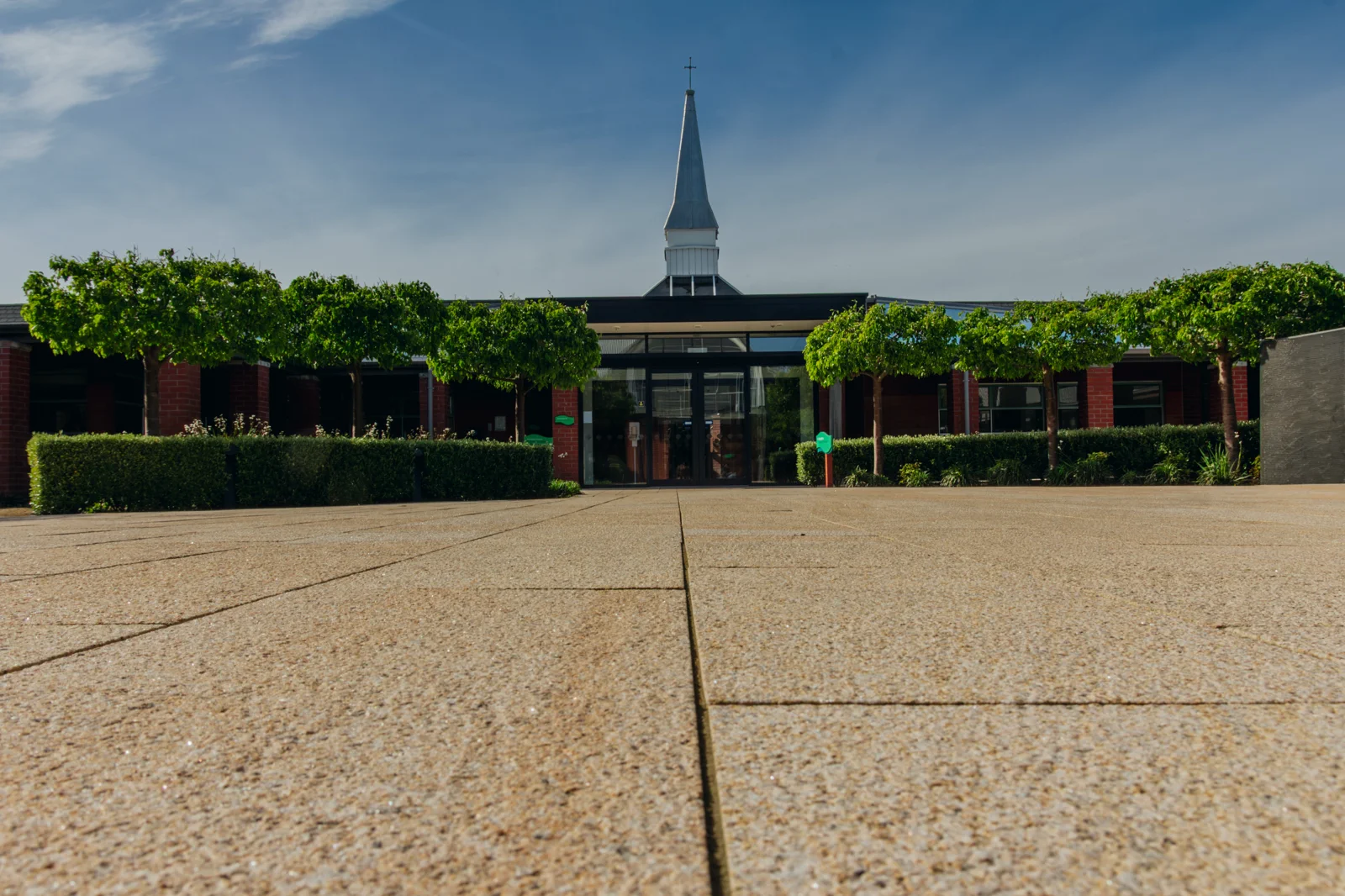 Retreat centre courtyard path with chapel spire