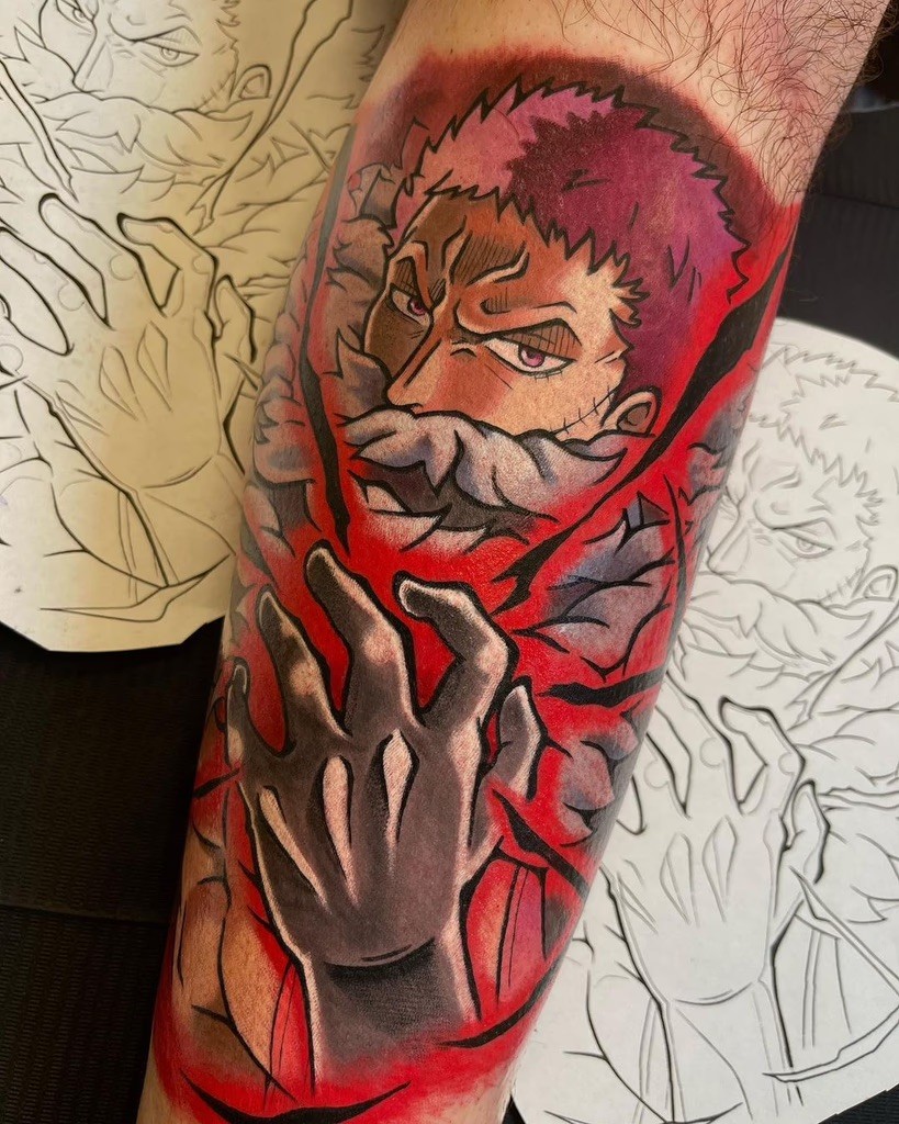 Vivid and dramatic tattoo of Charlotte Katakuri from One Piece, with rich red accents and intense shading by Brandon Zarichny.