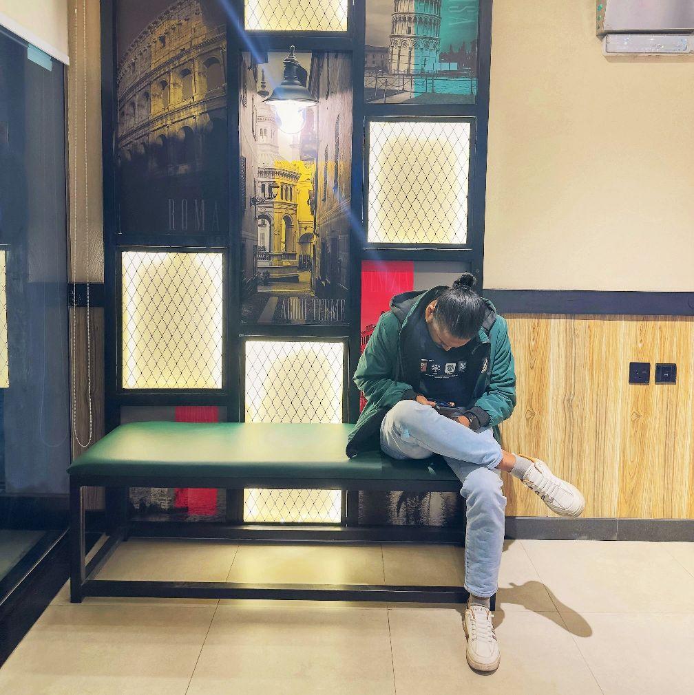 Portrait of portfolio creator – back view