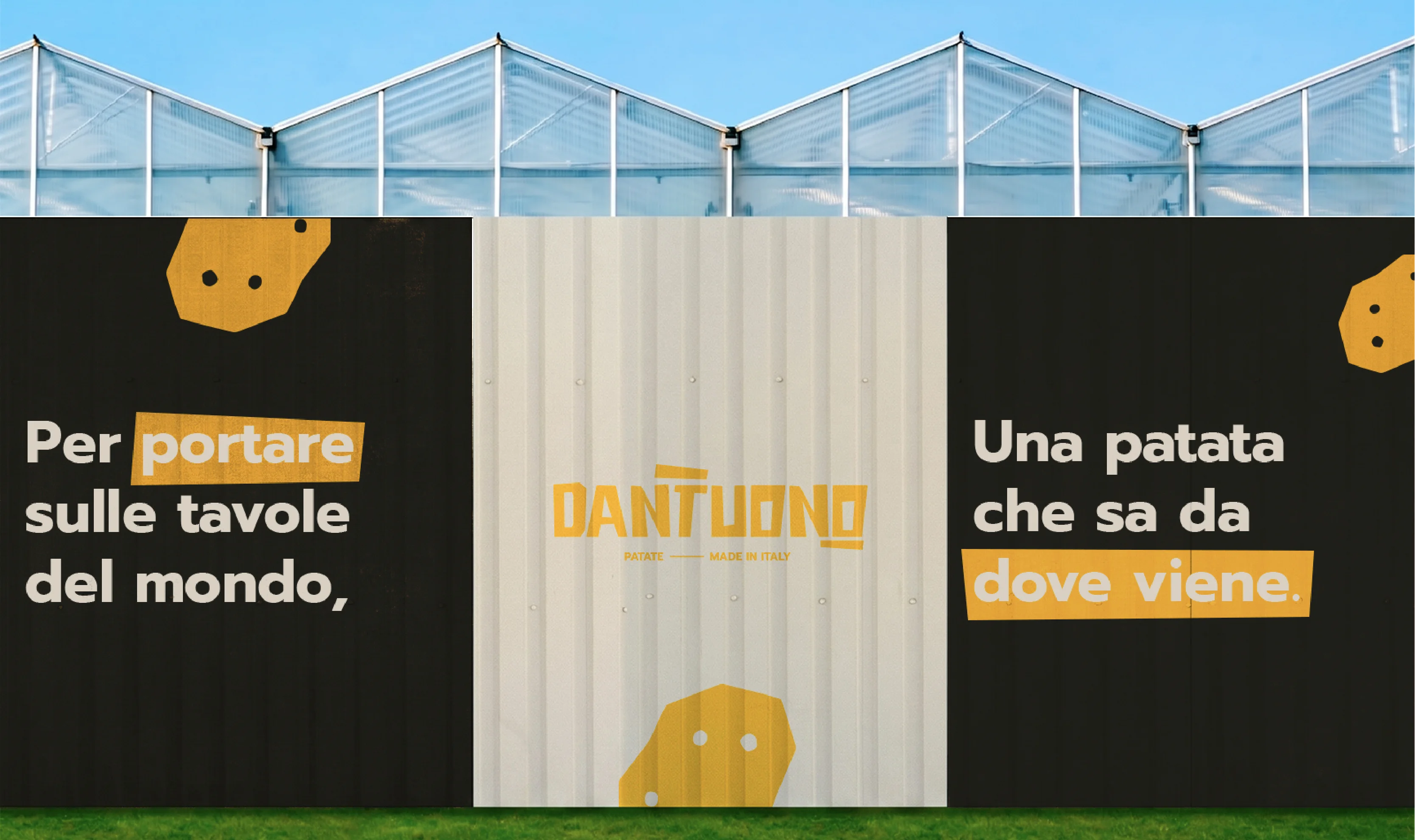 Dantuono outdoor banner mockup with Italian brand payoff on corrugated wall and greenhouse.