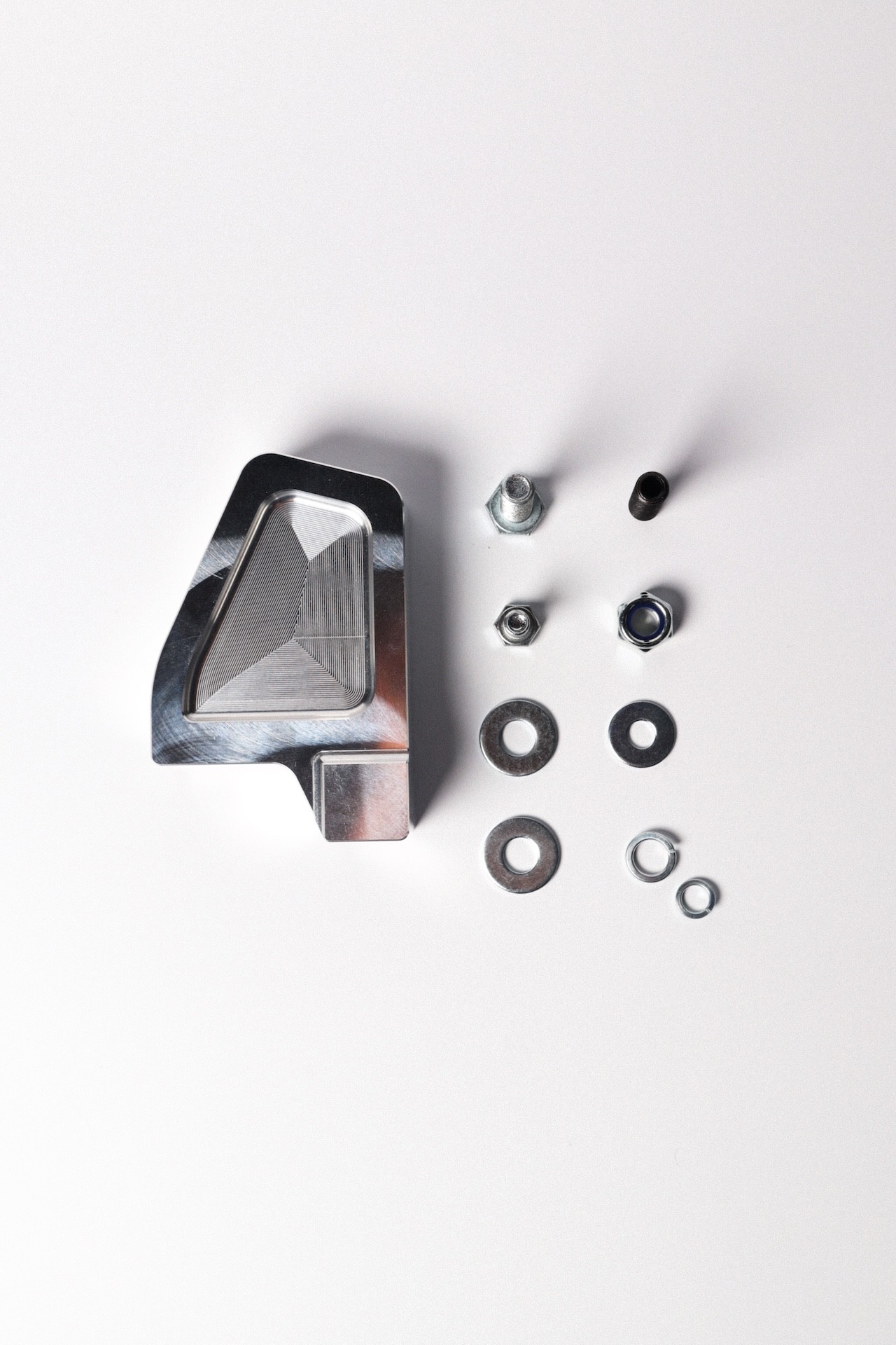 Top down shot of an engine mount and bolts