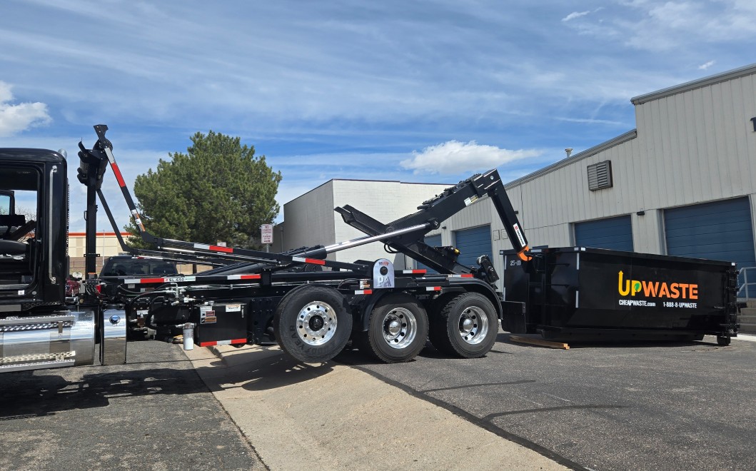 Dumpter outisde of a residential house