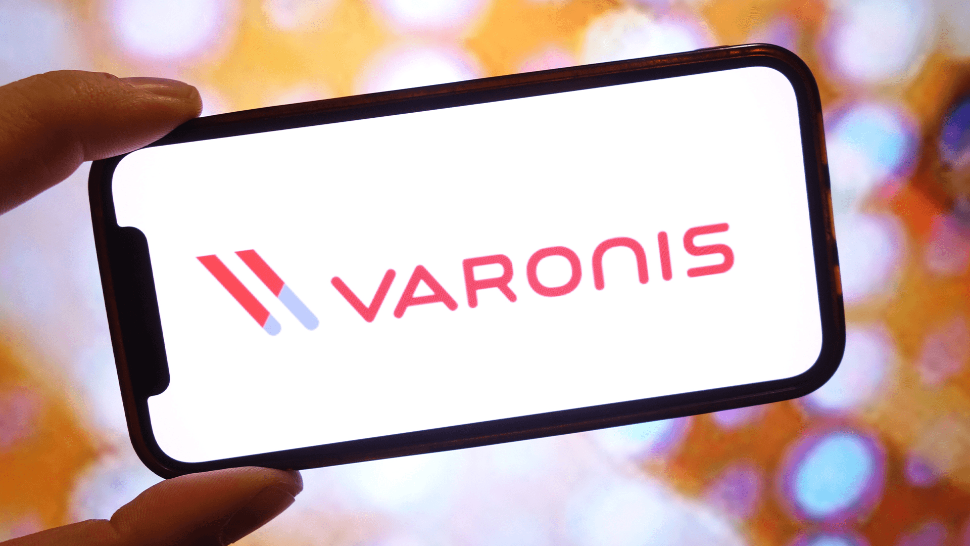 Mobile phone shows Varonis app -Varonis Alternatives
