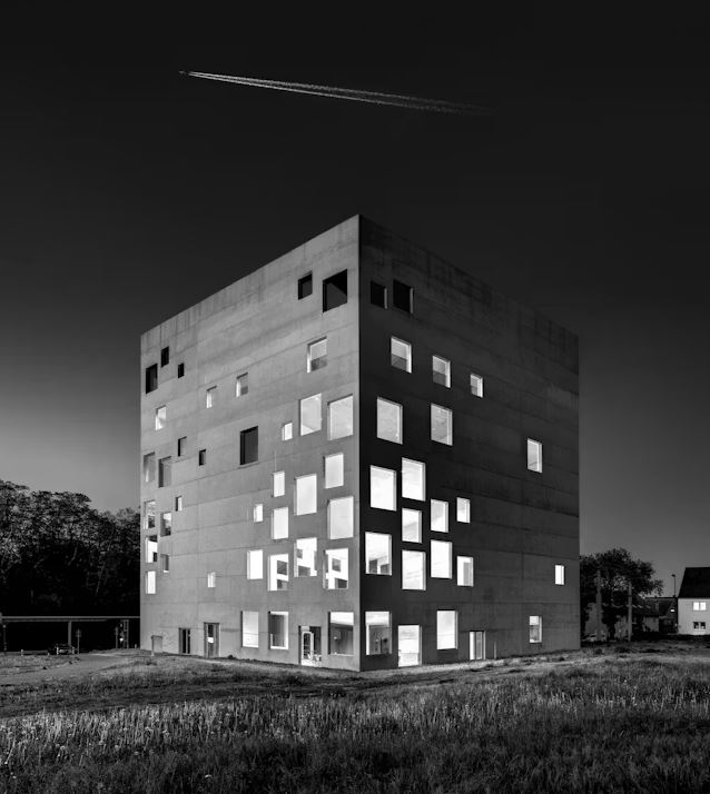 young people sat at the front of a sailboat