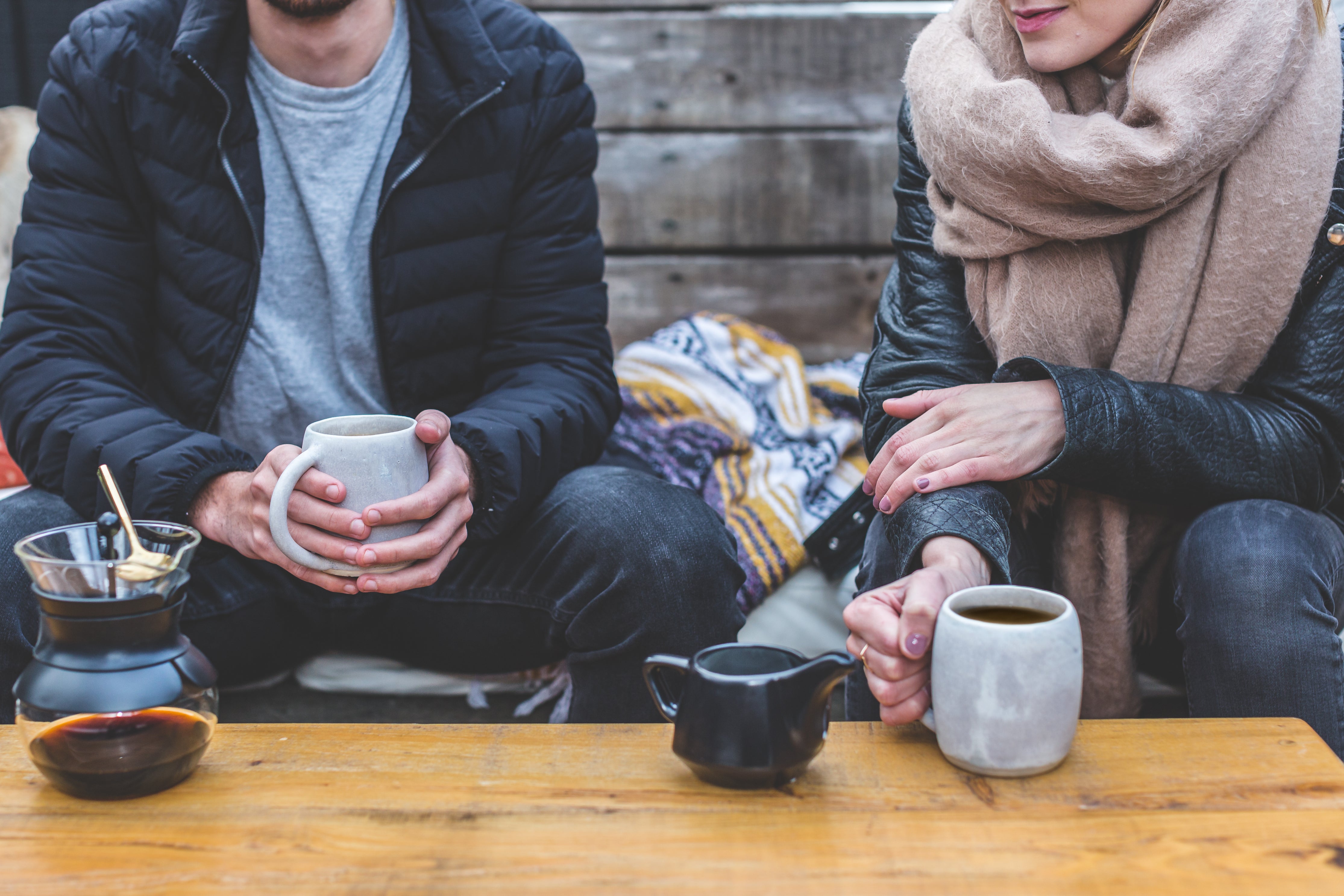 couple drinking coffee in the cold