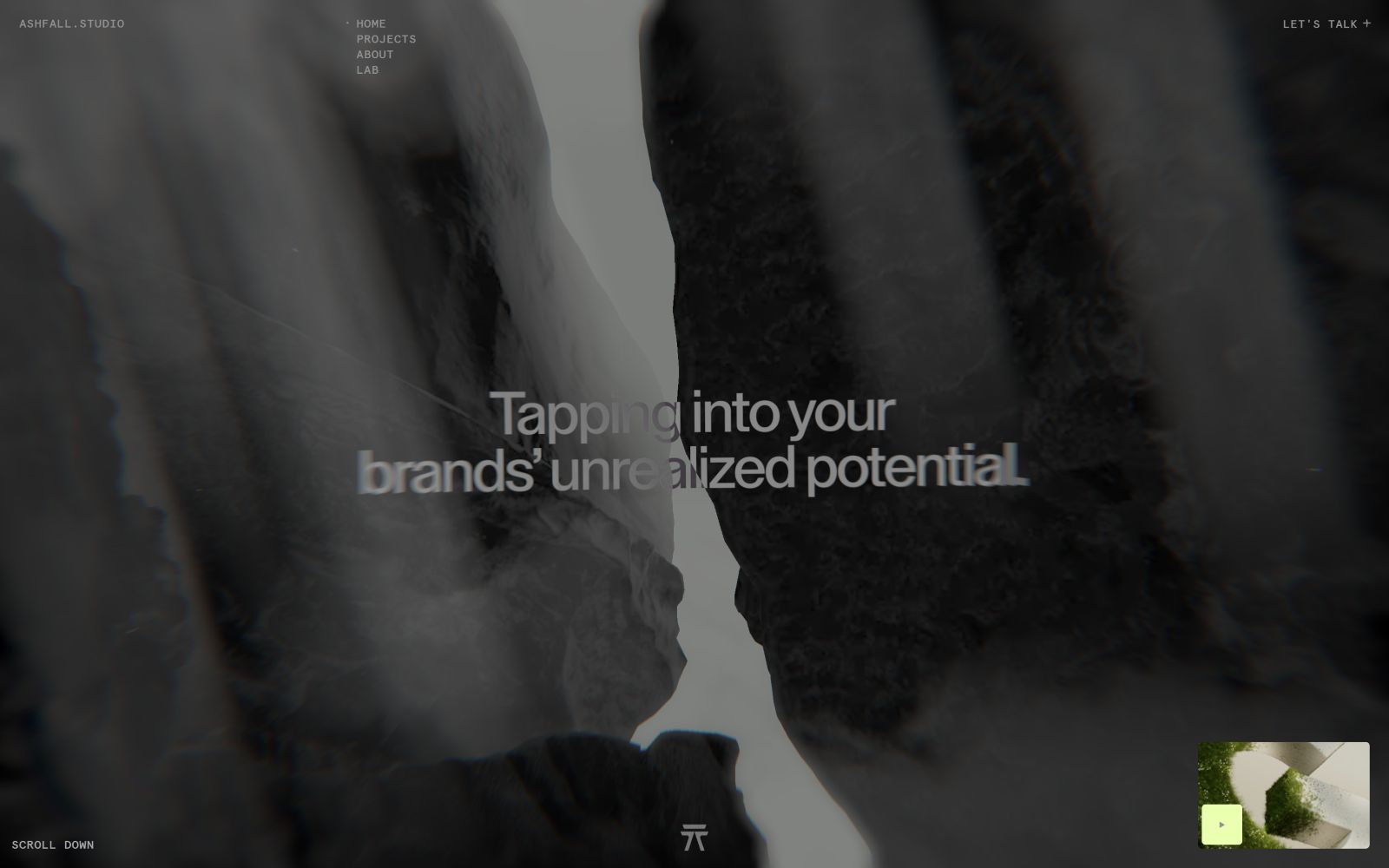 Misty rock formations with overlay text: "Tapping into your brand's unrealized potential." Minimal navigation text at corners.