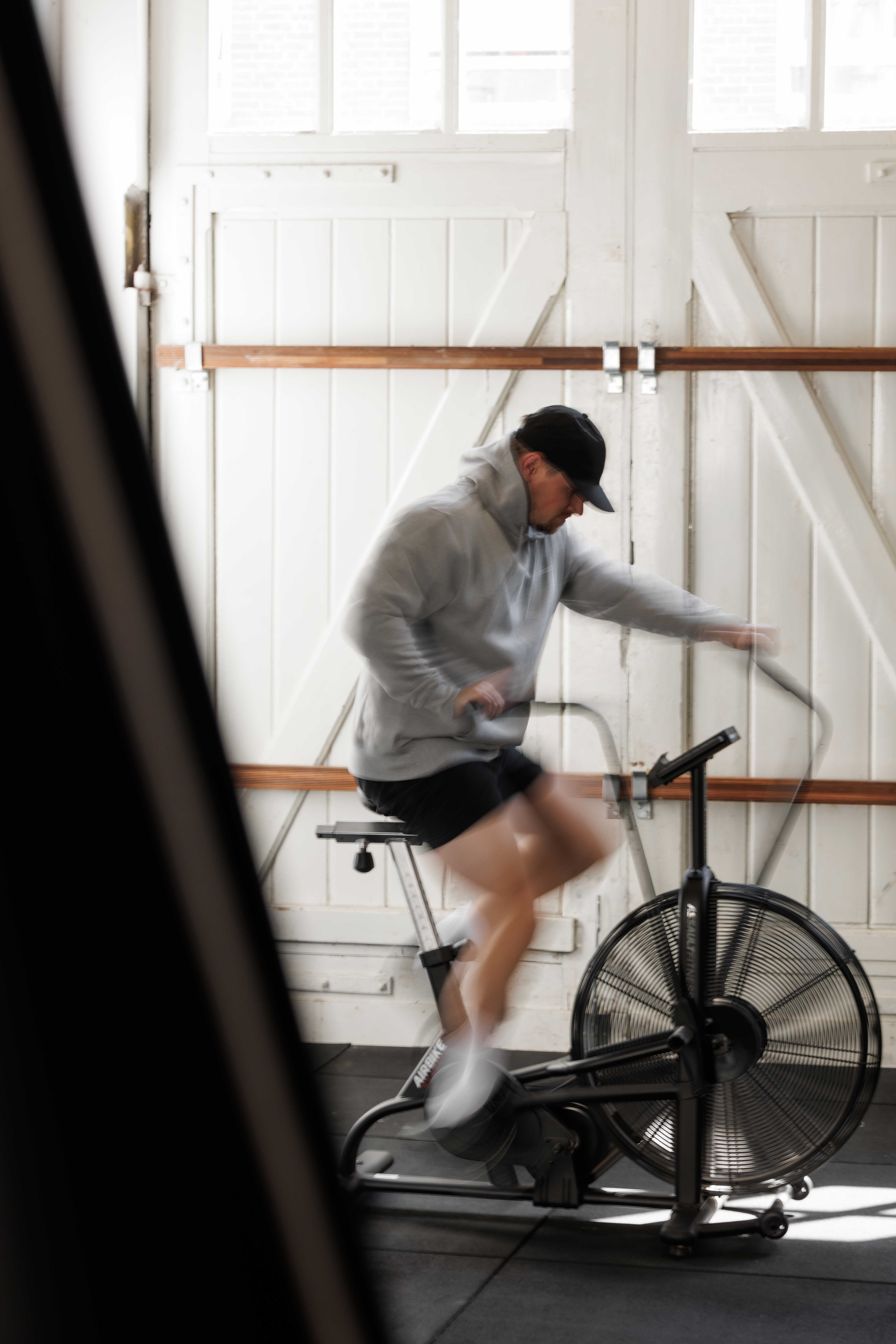 Streetside billboard with flyposters of the Batch.Works brand and illustrations