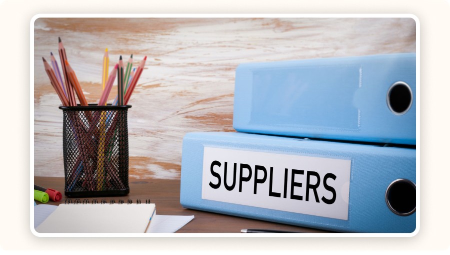 Blue binders labeled “Suppliers”&nbsp;