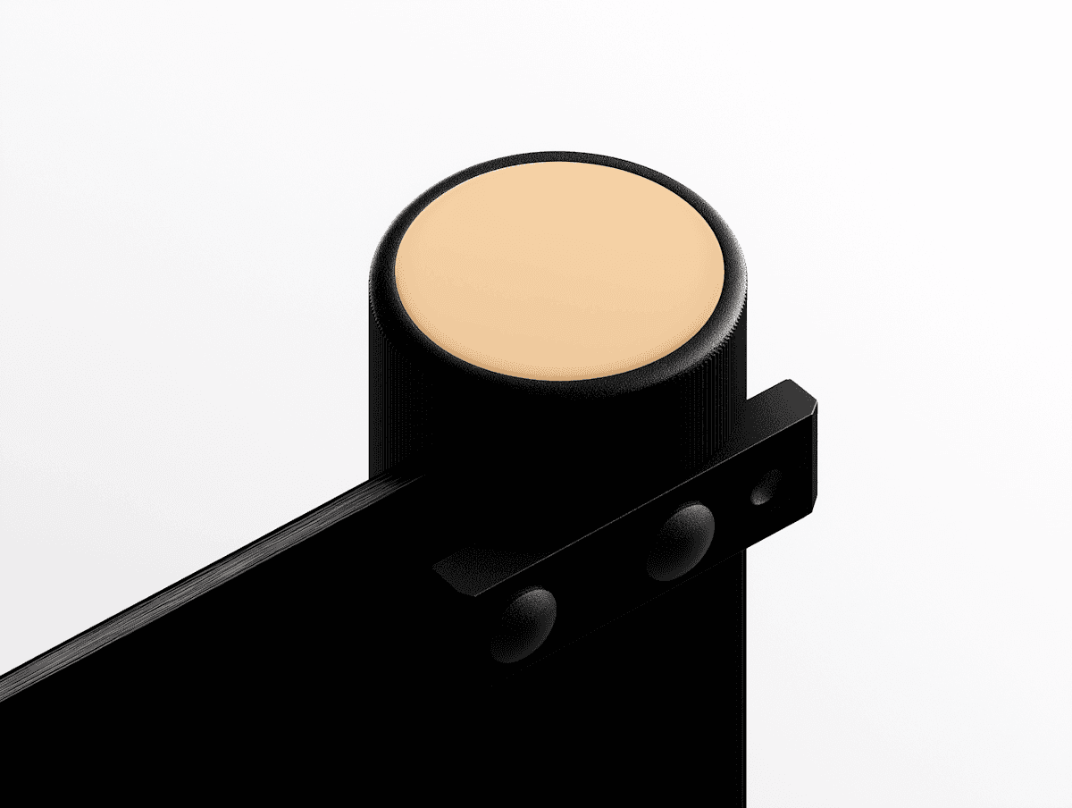 A fuzzy, green, abstract shape against black.