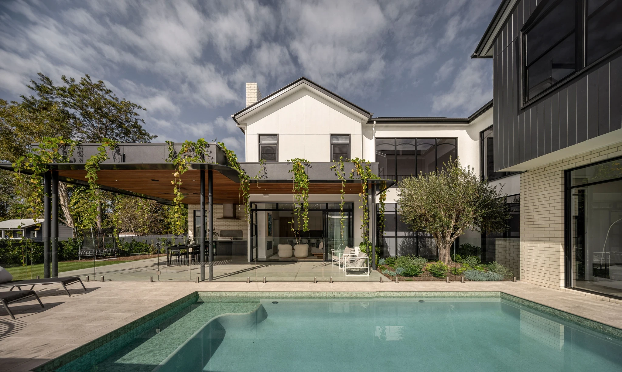 Outdoor kitchen and poolside entertaining area Hawthorne