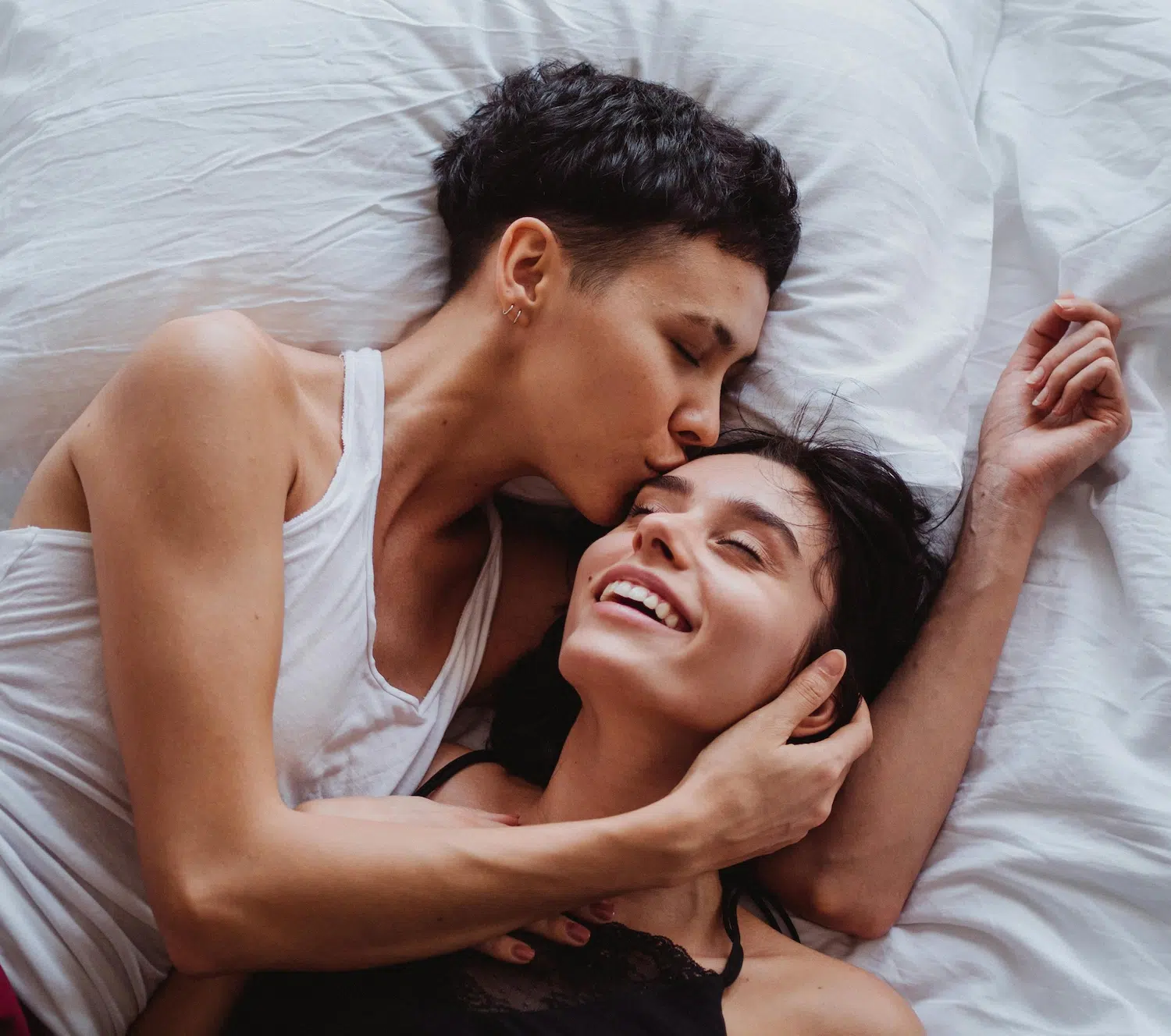 Loving same-sex couple sharing an intimate and joyful moment, symbolizing safety, acceptance, and connection through lesbian affirming therapy in Los Angeles.