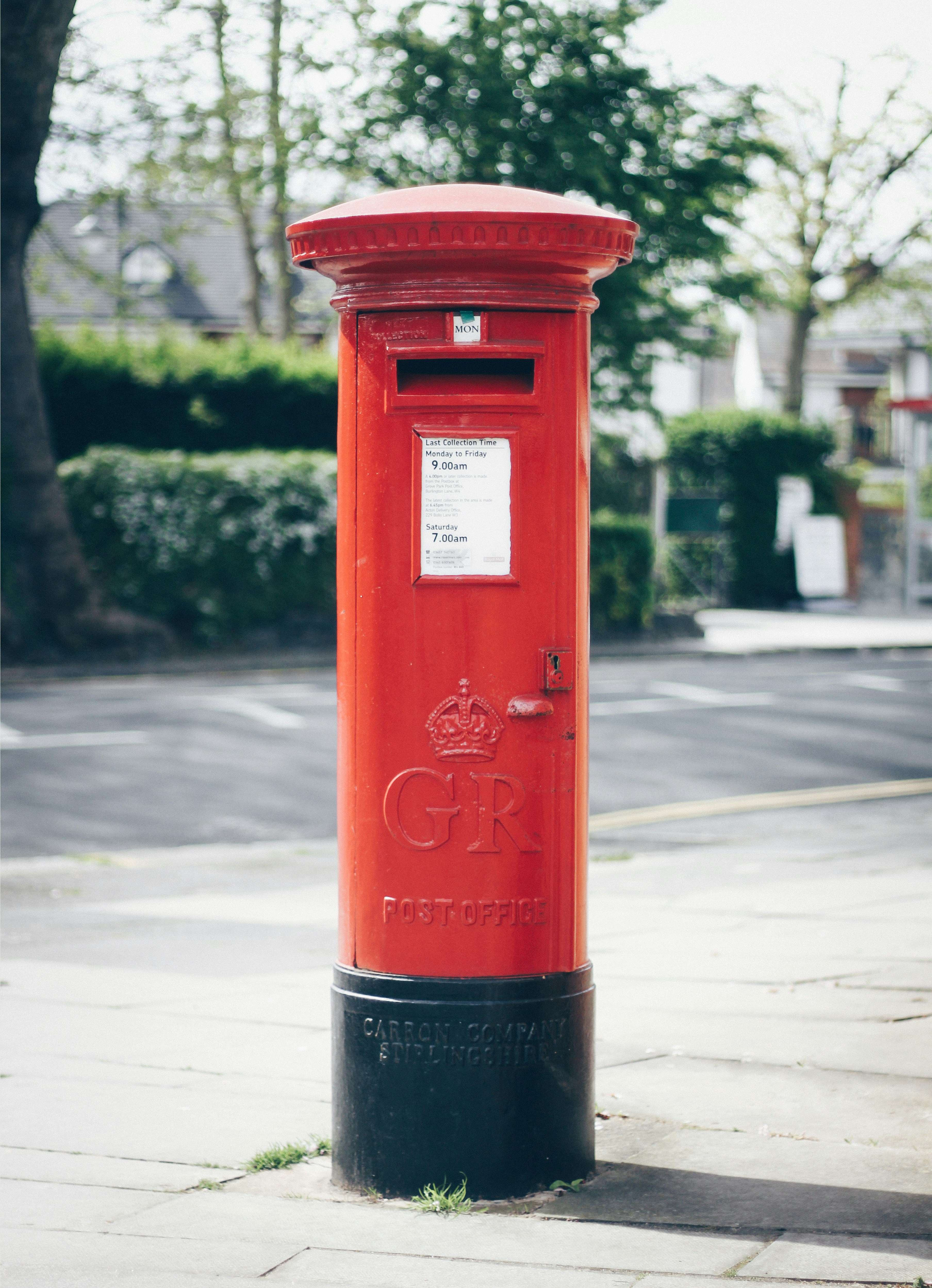 red and black GR post office letter container