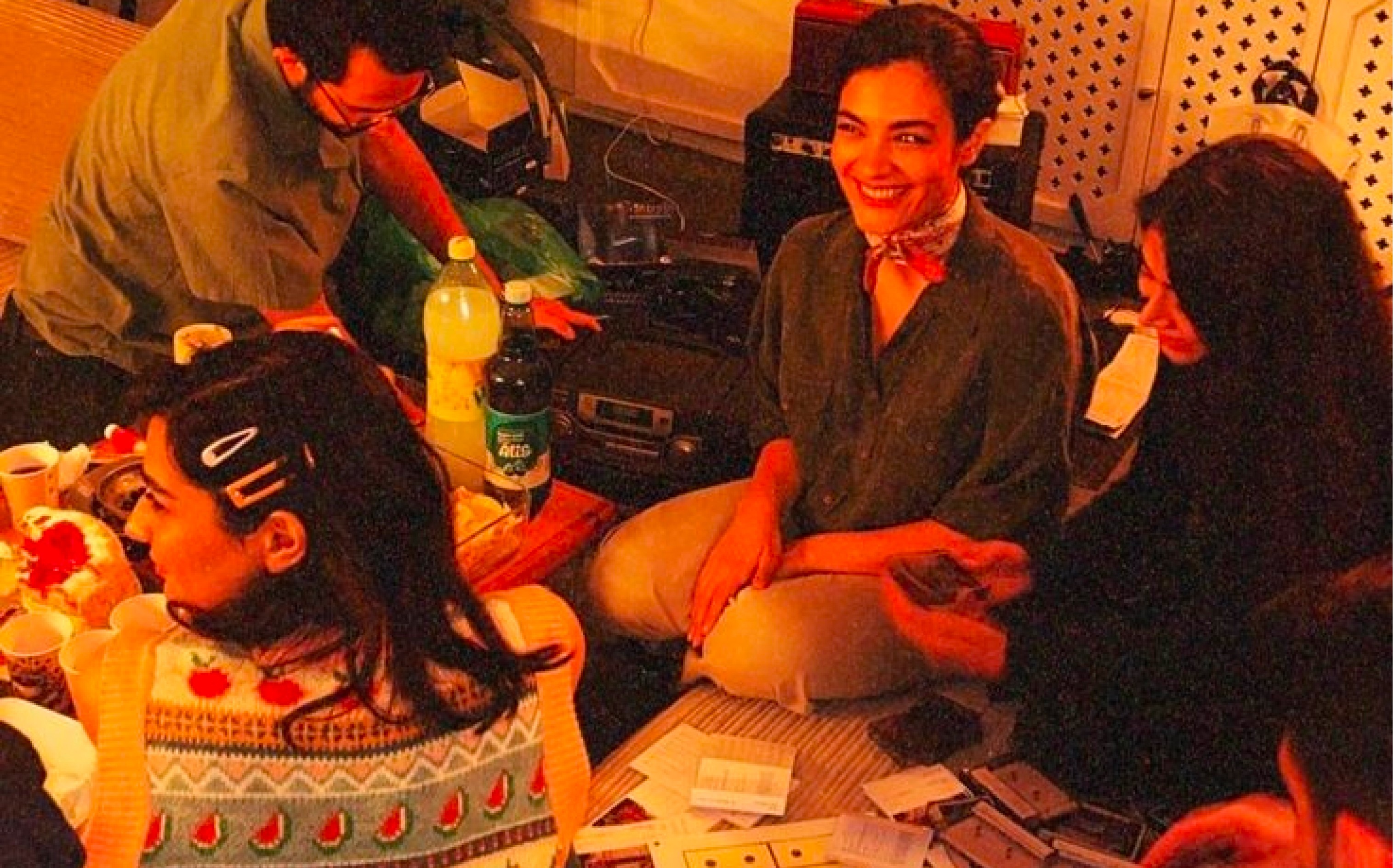 End-of-night moment where friends compare completed to-do lists and celebrate finishing their life admin.