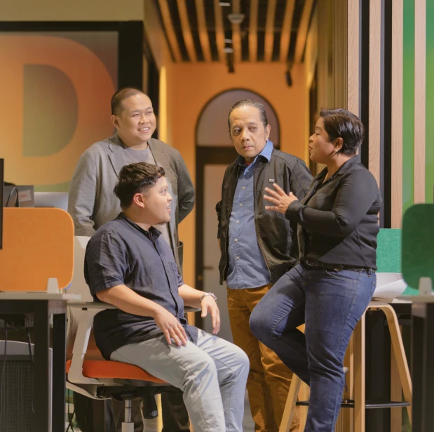 A group of individuals discussing.