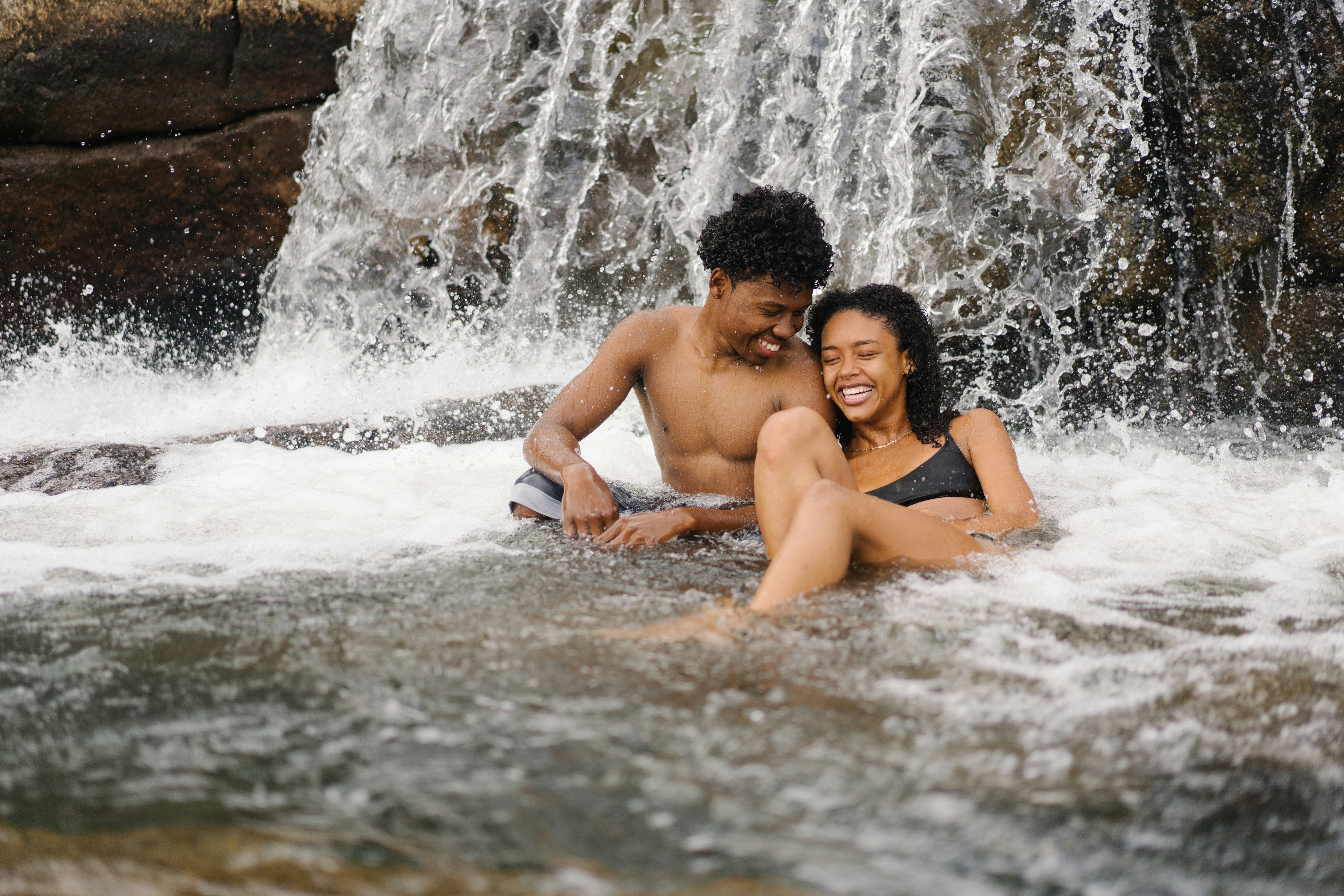 couple in waterfall