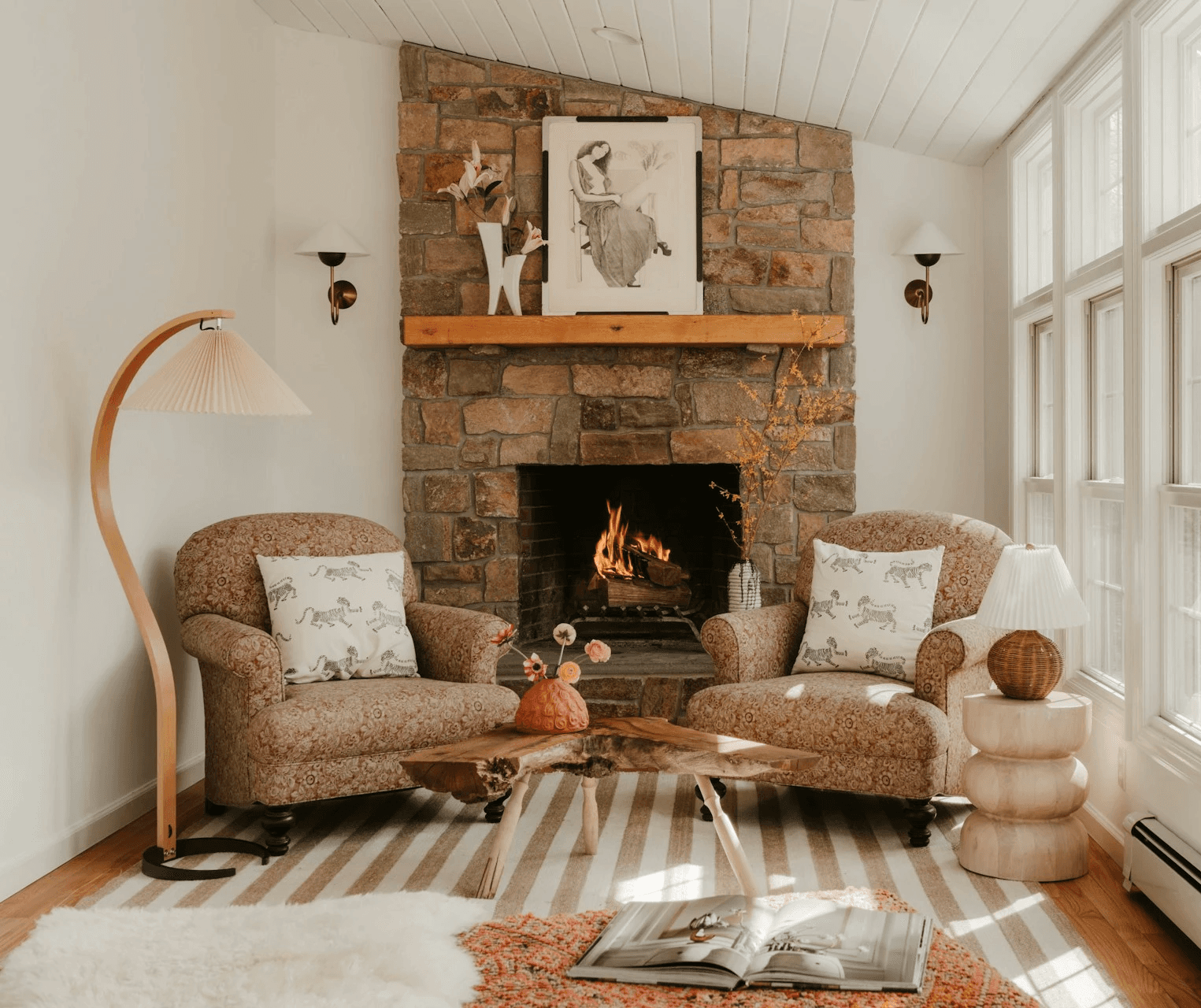 Two armchairs infront of the fireplace