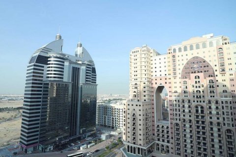 Aerial view of SIT Tower next to surrounding landmarks, showcasing its strategic real estate location.
