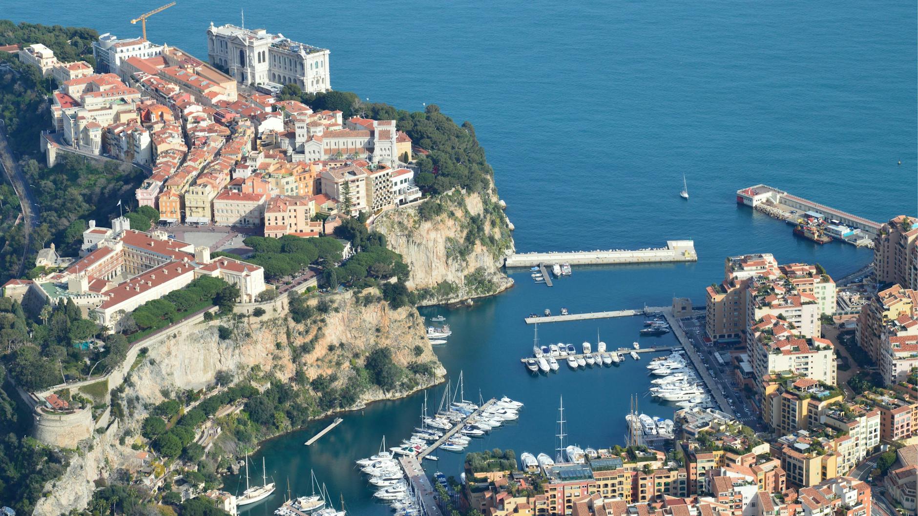 Breathtaking aerial view of Monaco's coastline, featuring the picturesque marina and historic architecture.
