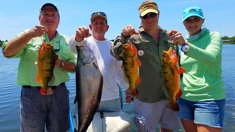A group showing the fish they caught