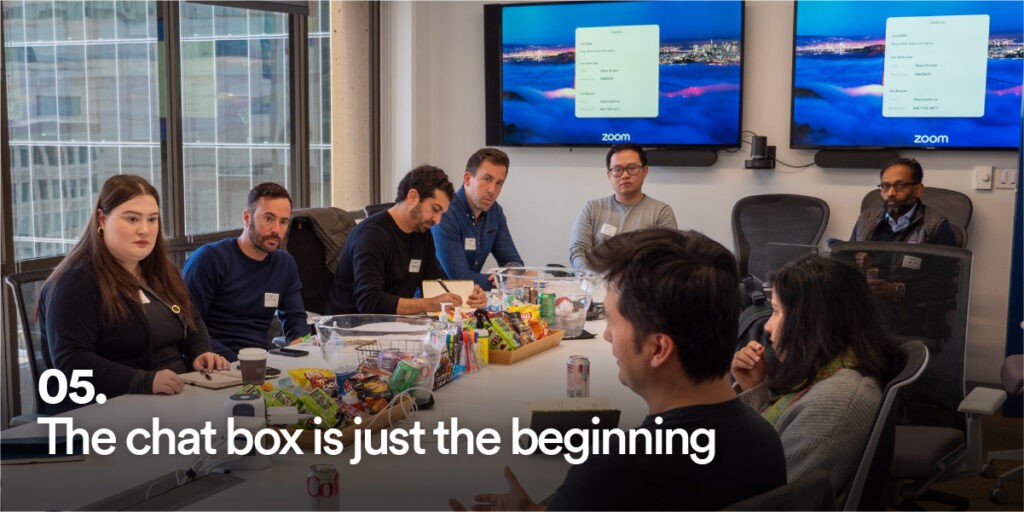 People at Generative AI Unconference with the text "the chat box is just the beginning"