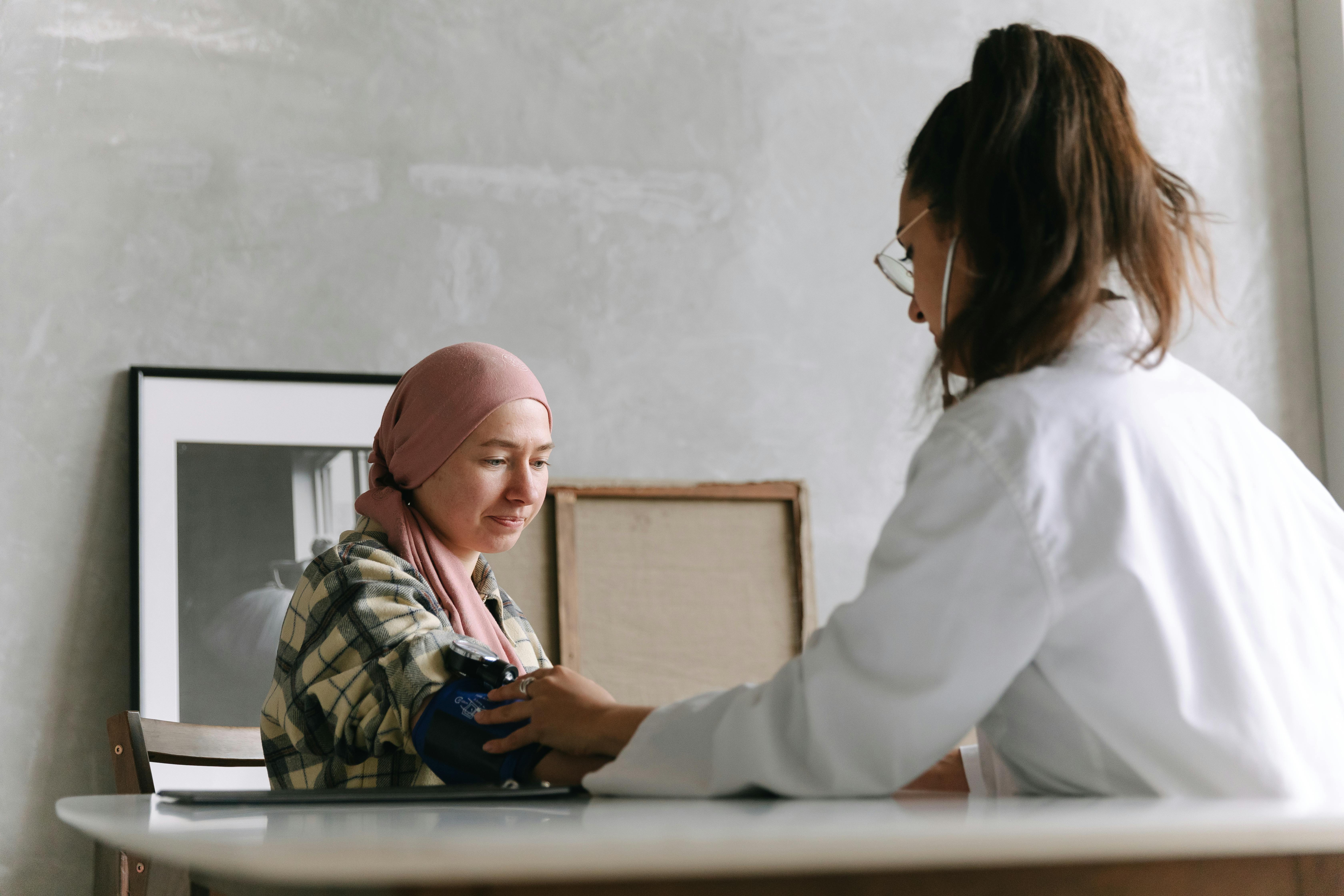 Doctor measuring vitals of patient