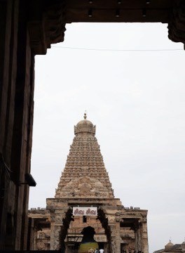 The Brihadeeswara temple tower seen through the outer arch