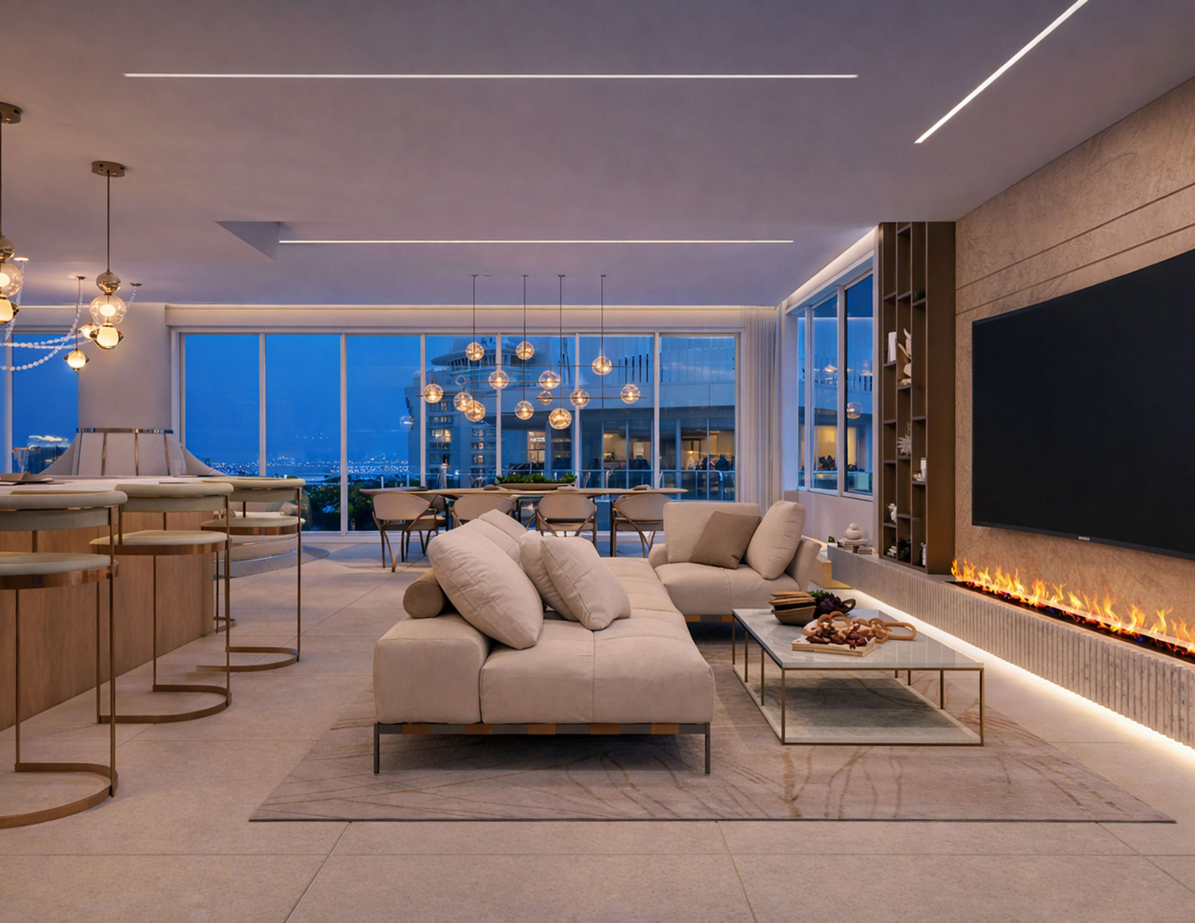 Modern luxury penthouse living room with open-plan layout, featuring cream leather sofas, marble coffee table, sleek fireplace with built-in TV, breakfast bar with gold-accent stools, and floor-to-ceiling windows with city views.