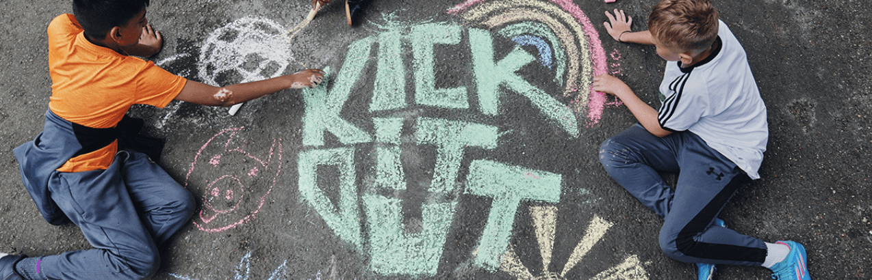 Kick It Out team using Salesforce Agentforce Nonprofit (formerly Nonprofit Cloud) to streamline fan education sessions.