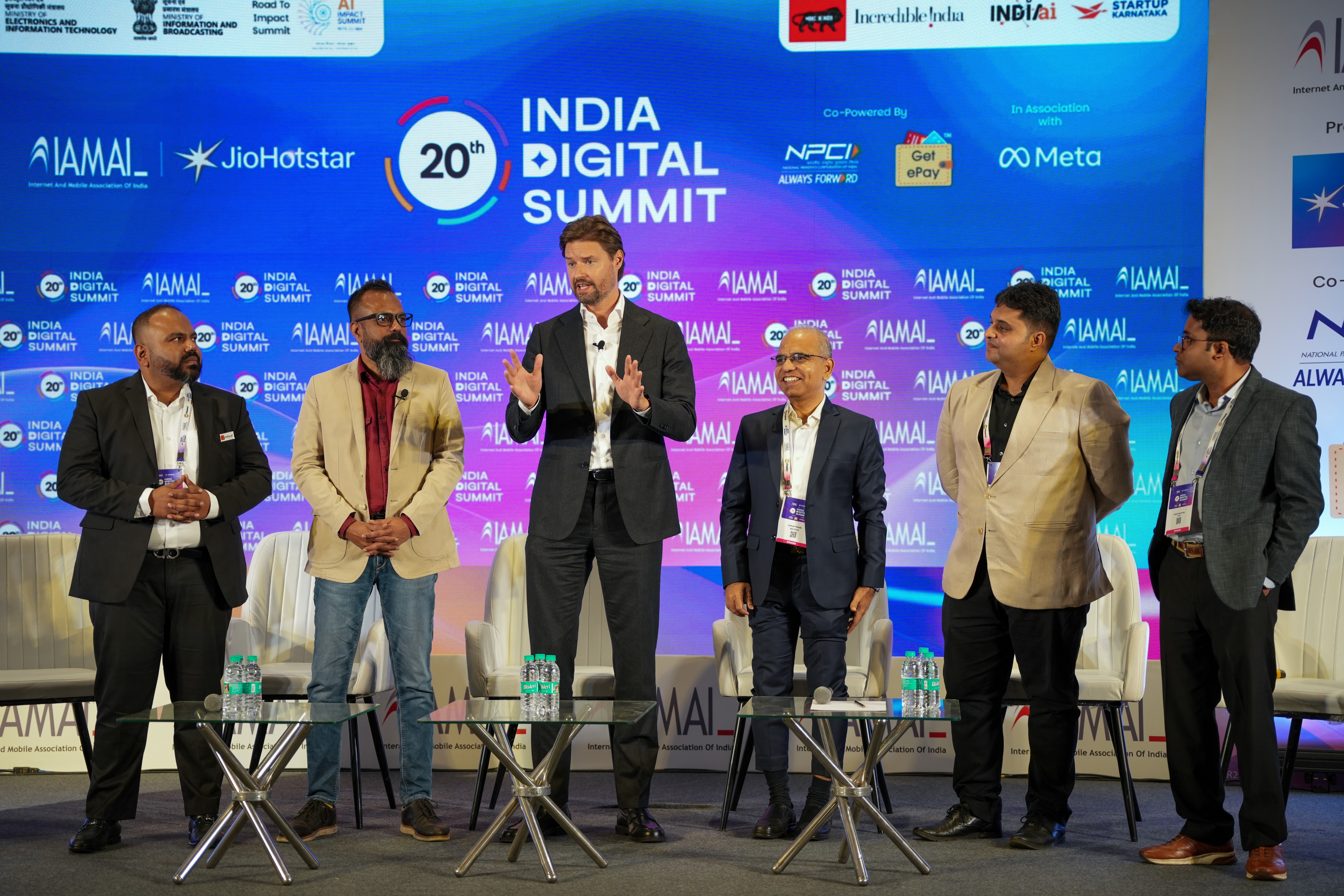 Crypto conference audience listening to keynote speaker