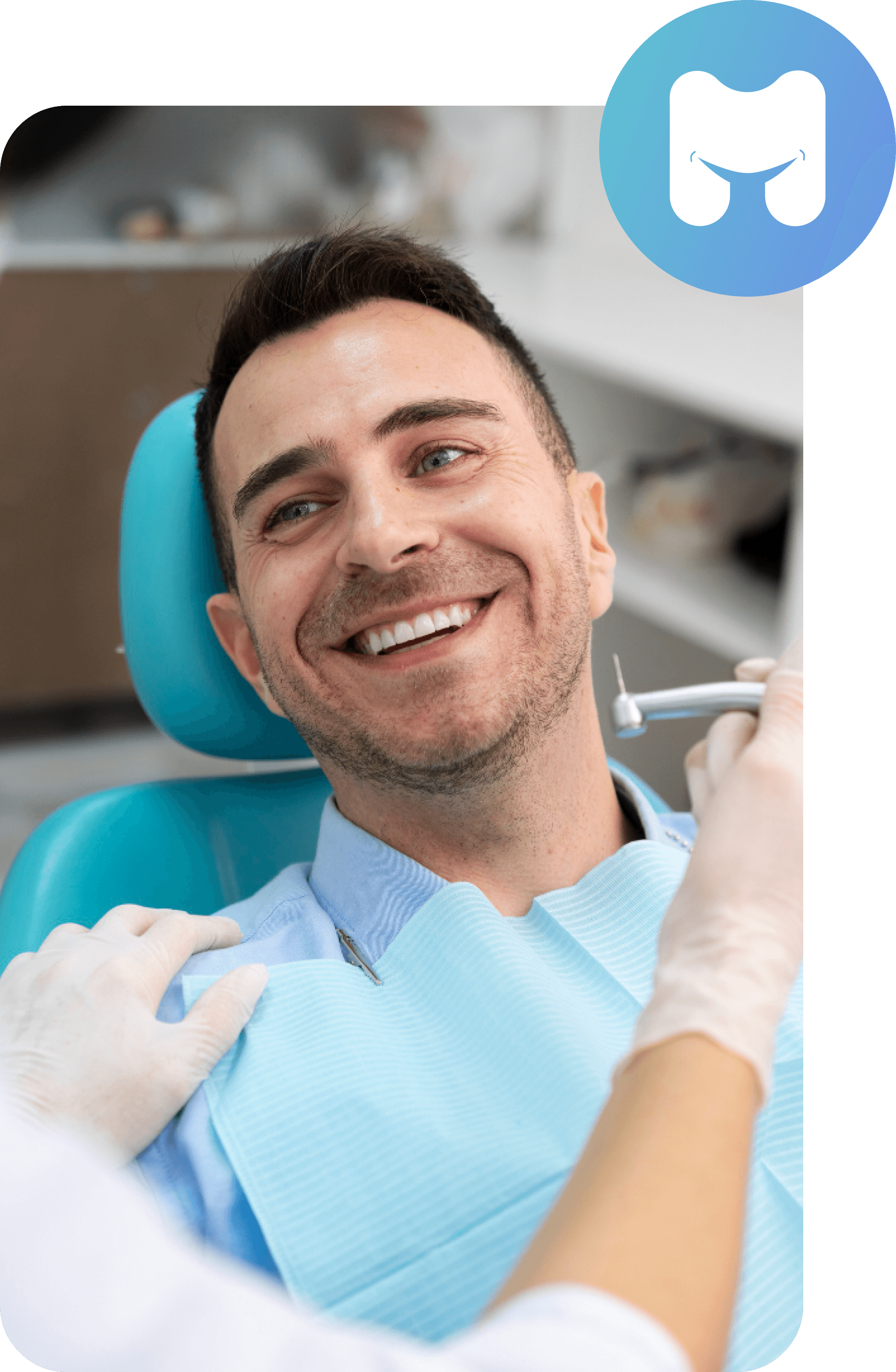 A male patient sitting in a dental chair, smiling and looking satisfied with his dental treatment while a dental professional adjusts dental tools.