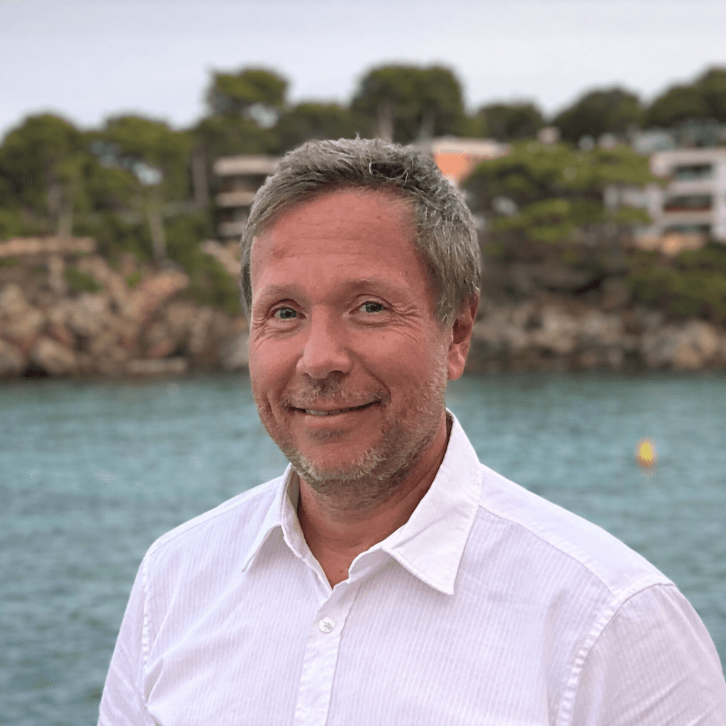 person sitting in a chair in front of a man