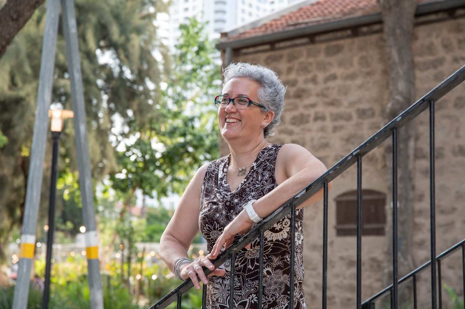 man in white crew neck shirt wearing black sunglasses