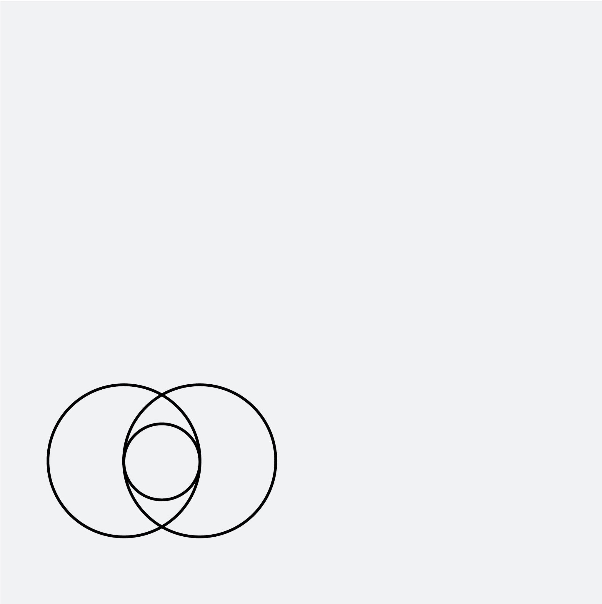 Professional headshot of a brunette woman in a white shirt, arms crossed, on a clean minimal background.