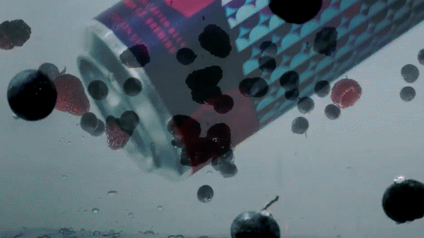 Person in a white off-shoulder top using a MacBook laptop, with text overlay 'What's new in digital?' and the fabrica® logo in the top corner.